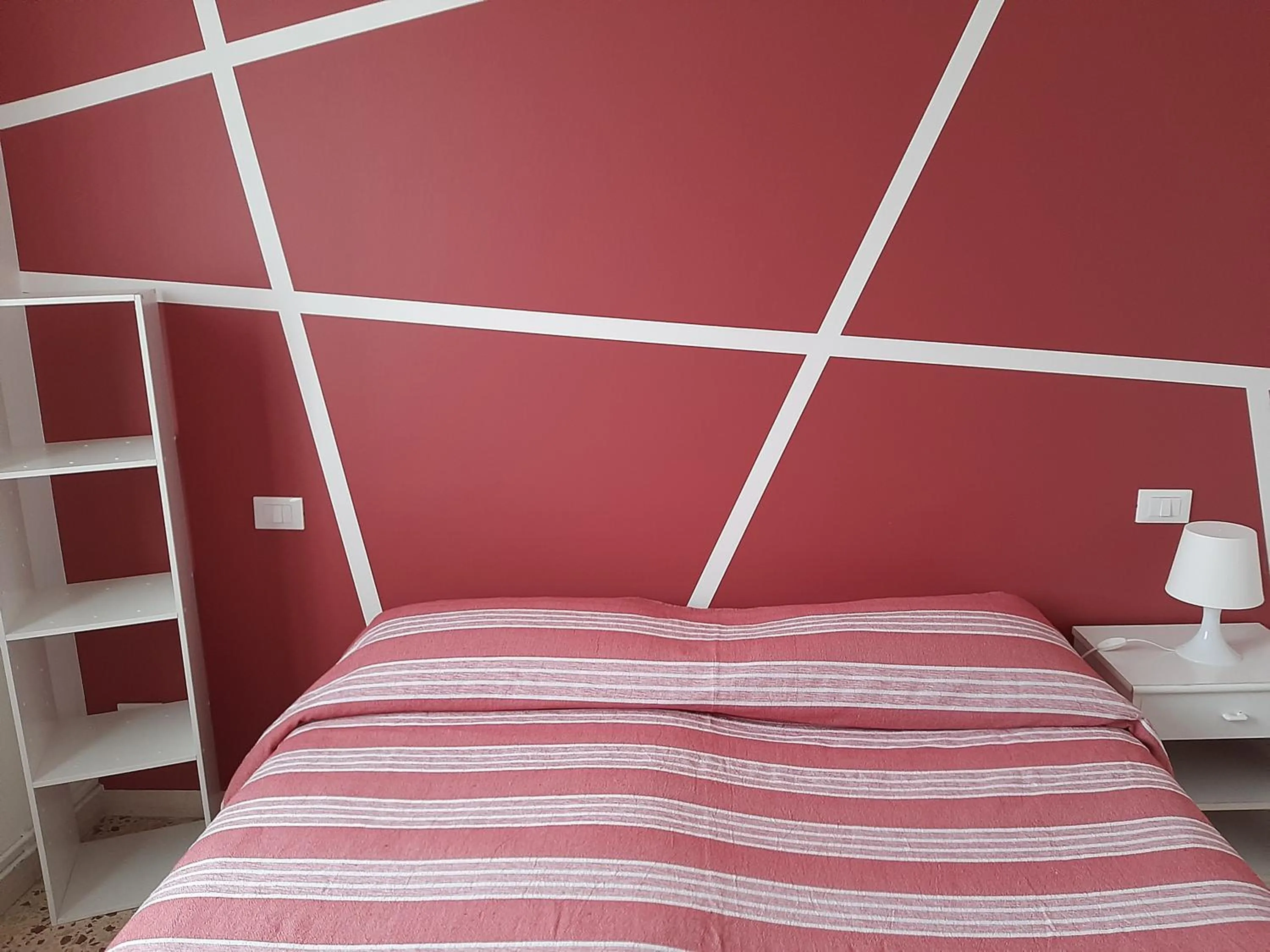 Bed in Gardenia Guest House