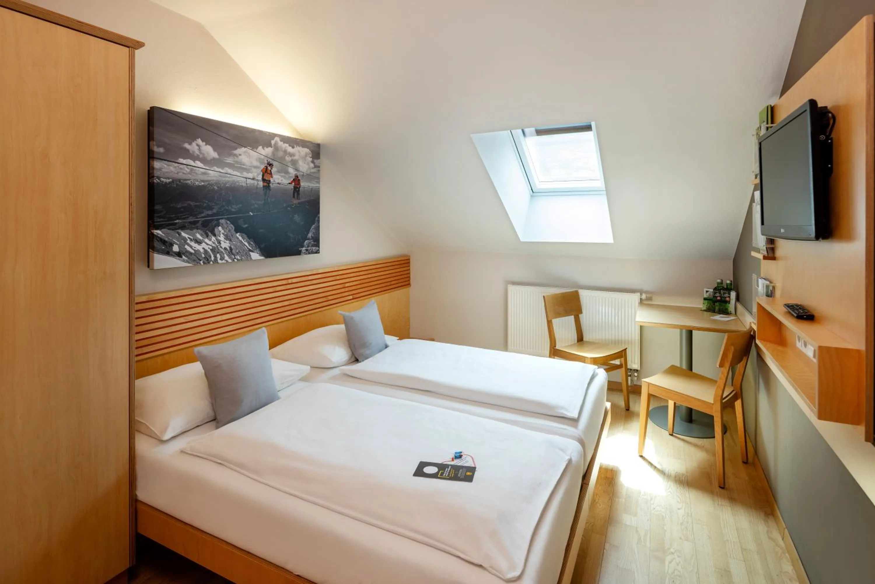 Photo of the whole room, Bed in JUFA Hotel Schladming