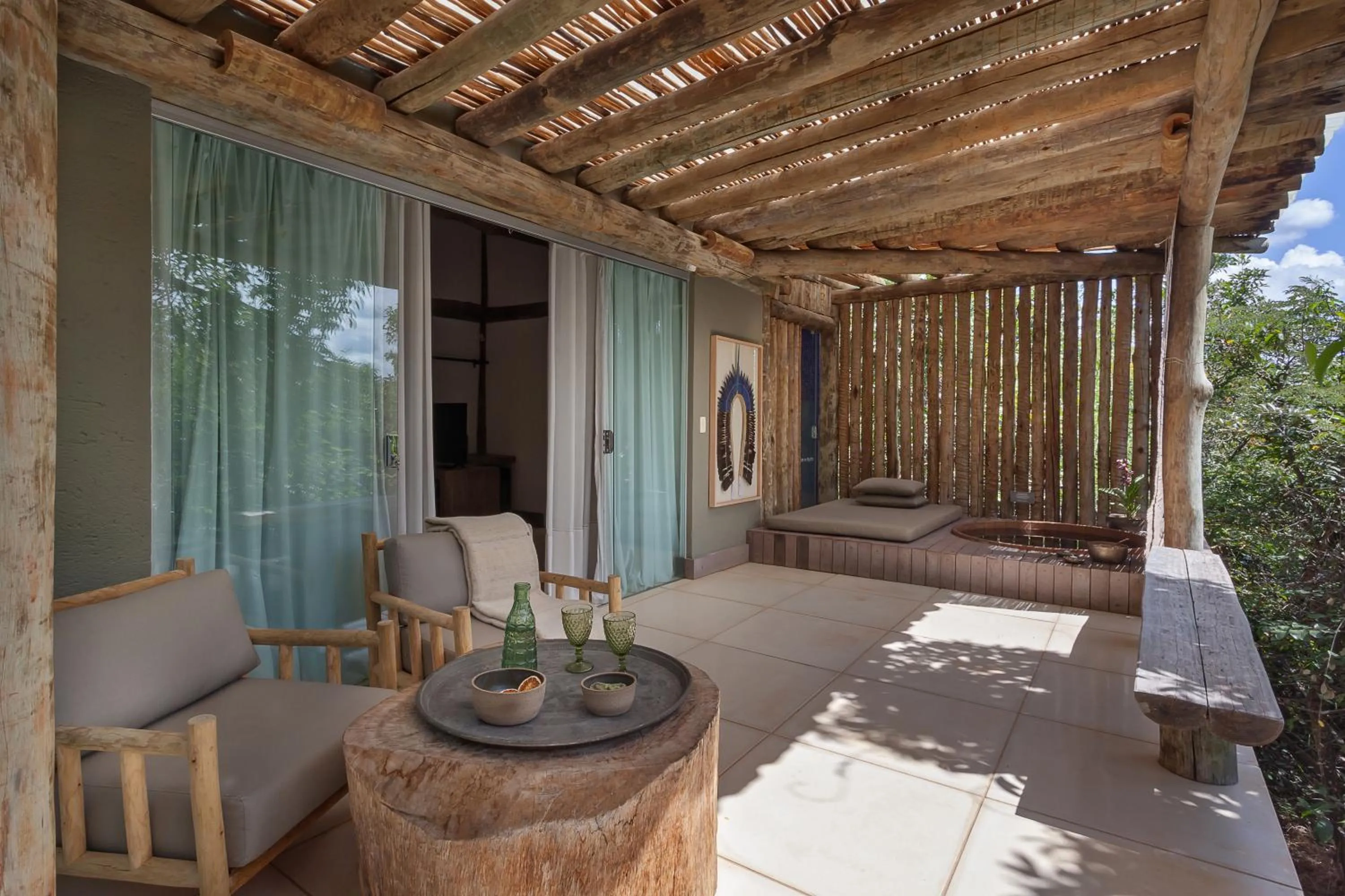 Seating area in Capim do Mato Pousada & Spa by L'Occitane