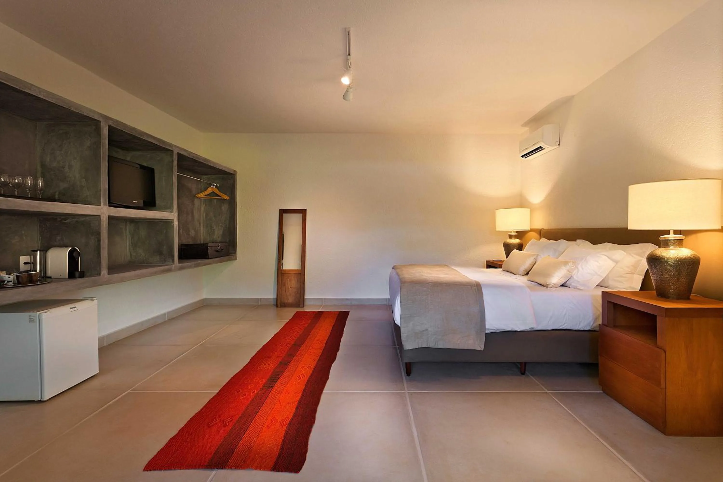 Photo of the whole room, Bed in Capim do Mato Pousada & Spa by L'Occitane