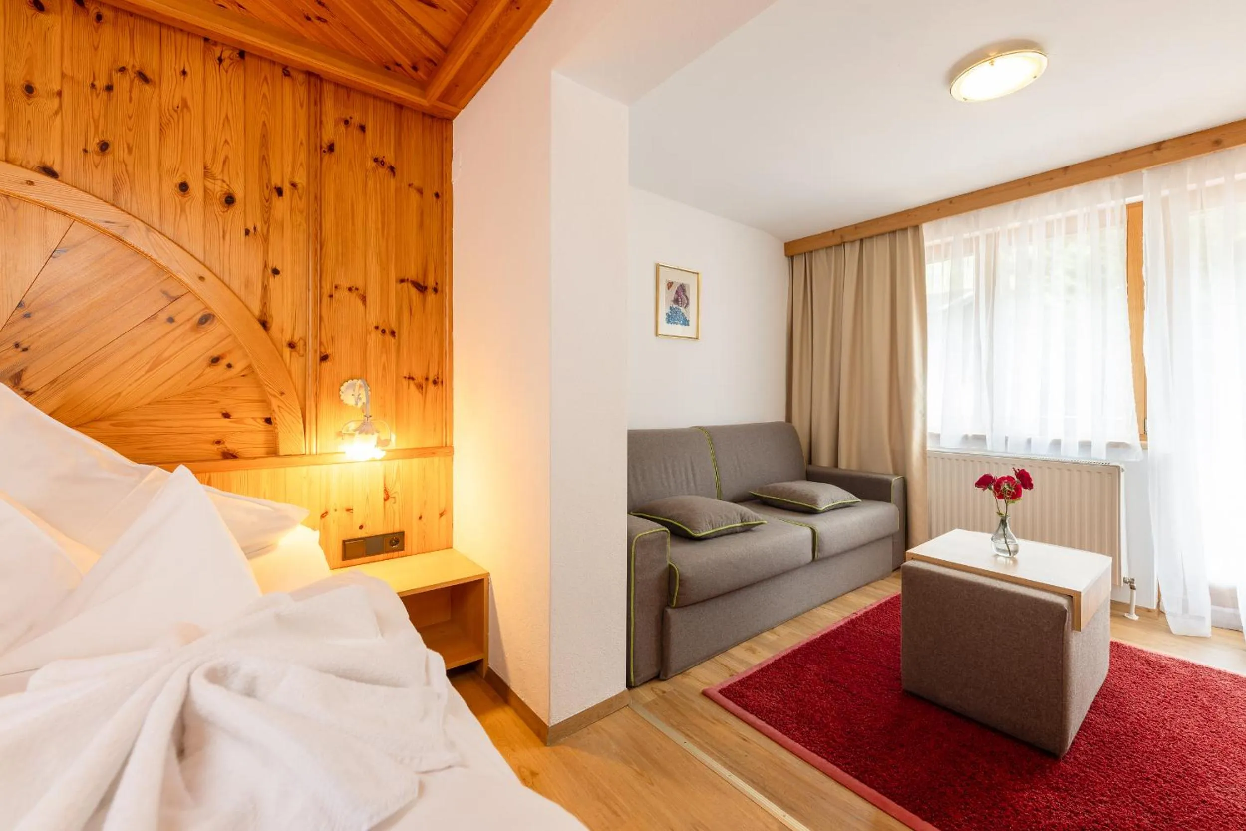 Seating area, Bed in Hotel Berghof