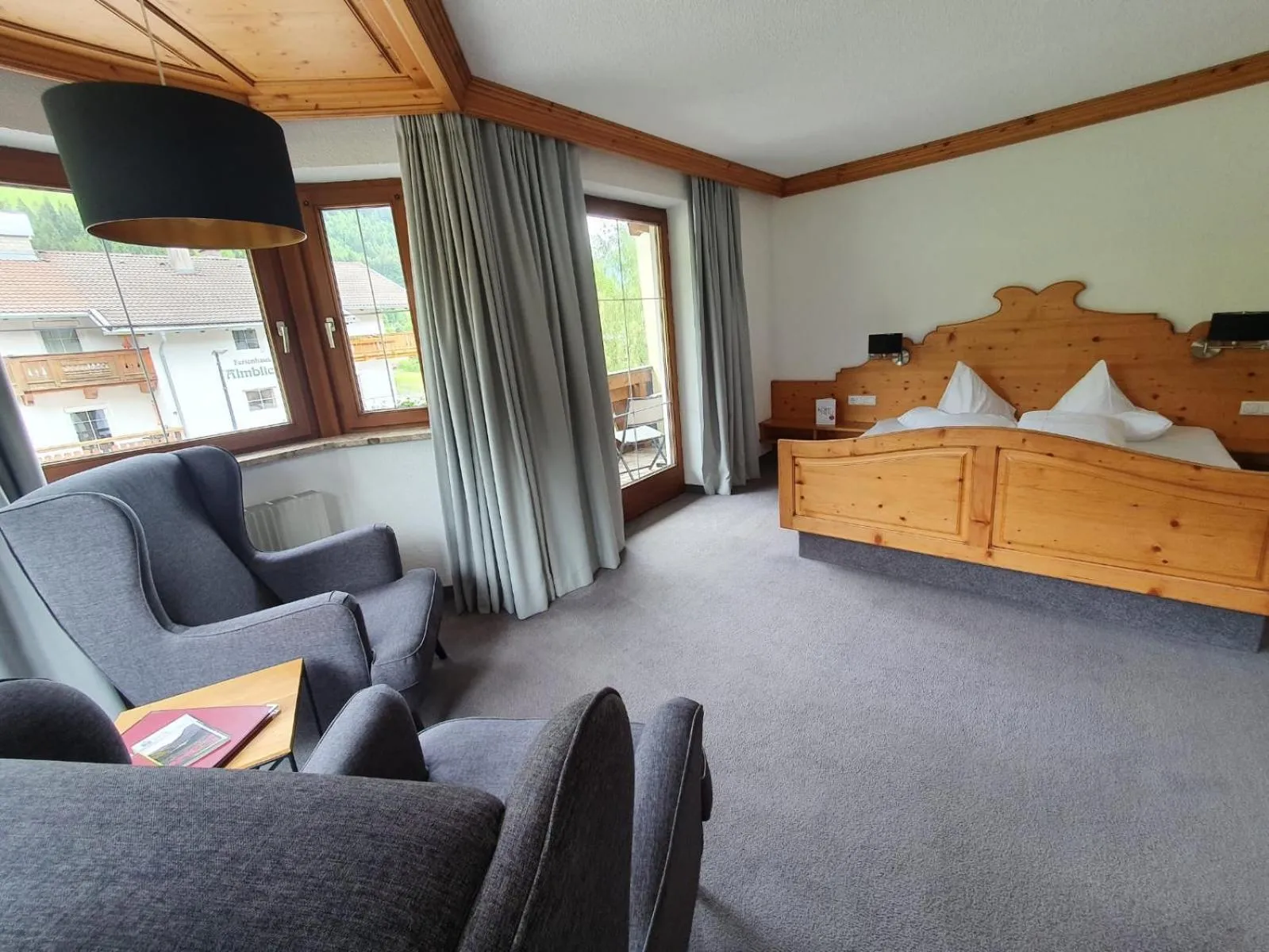 Seating area, Bed in Hotel Klockerhof