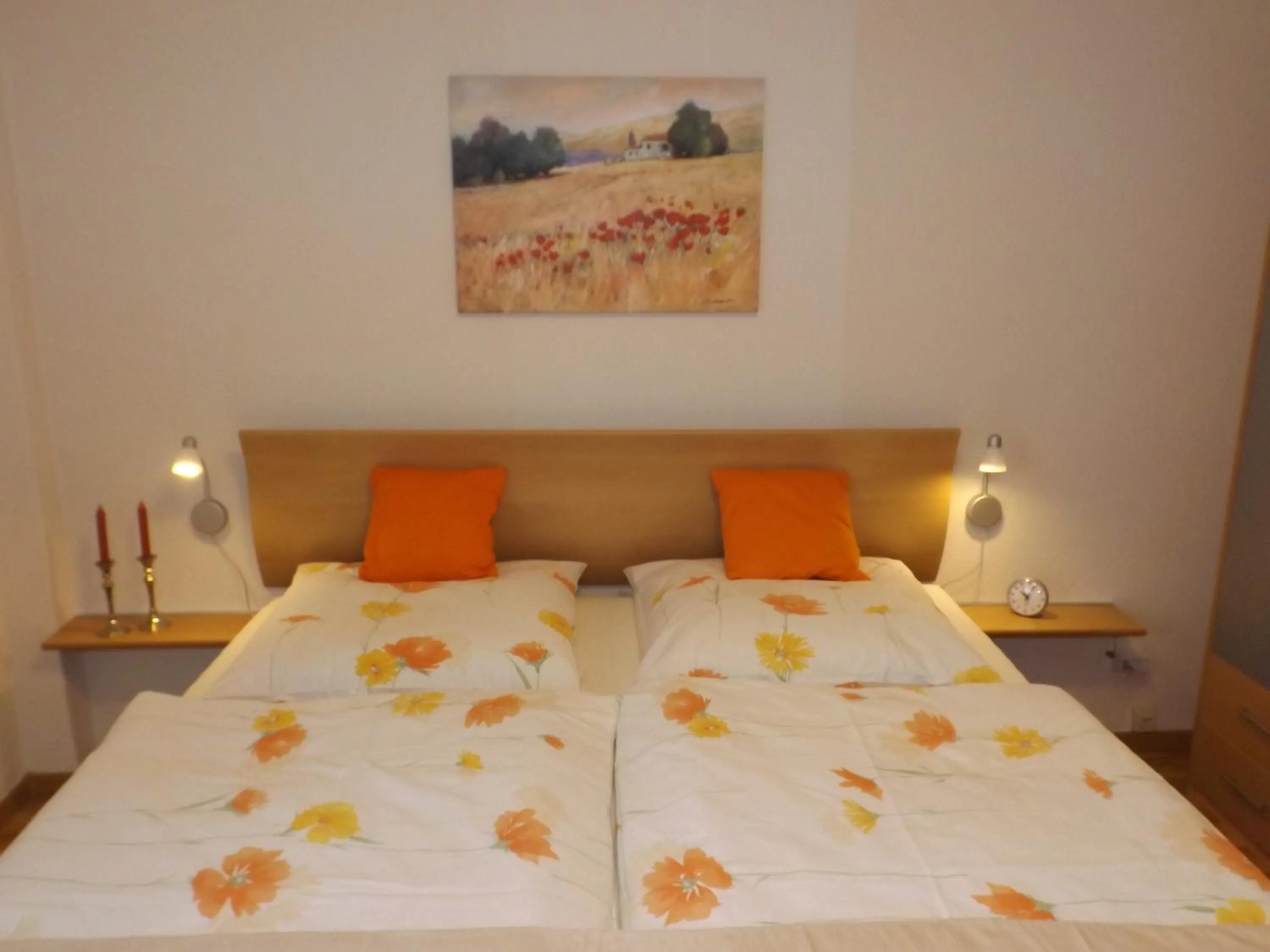 Bed in Premium-Ferienwohnungen Bergblick im Haus Hopfe