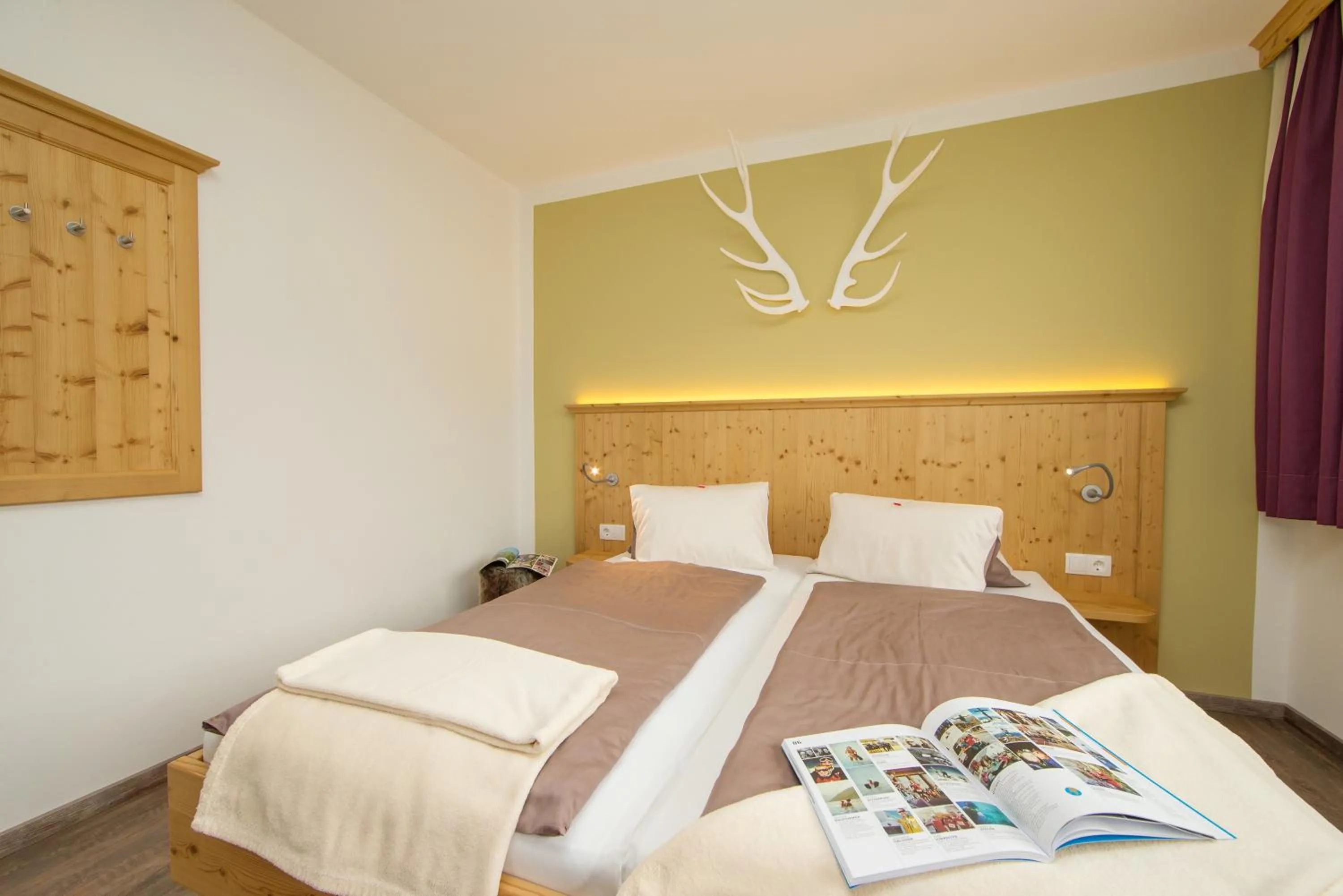 Bed in Comfort Hotel Garni Landhaus Gitti