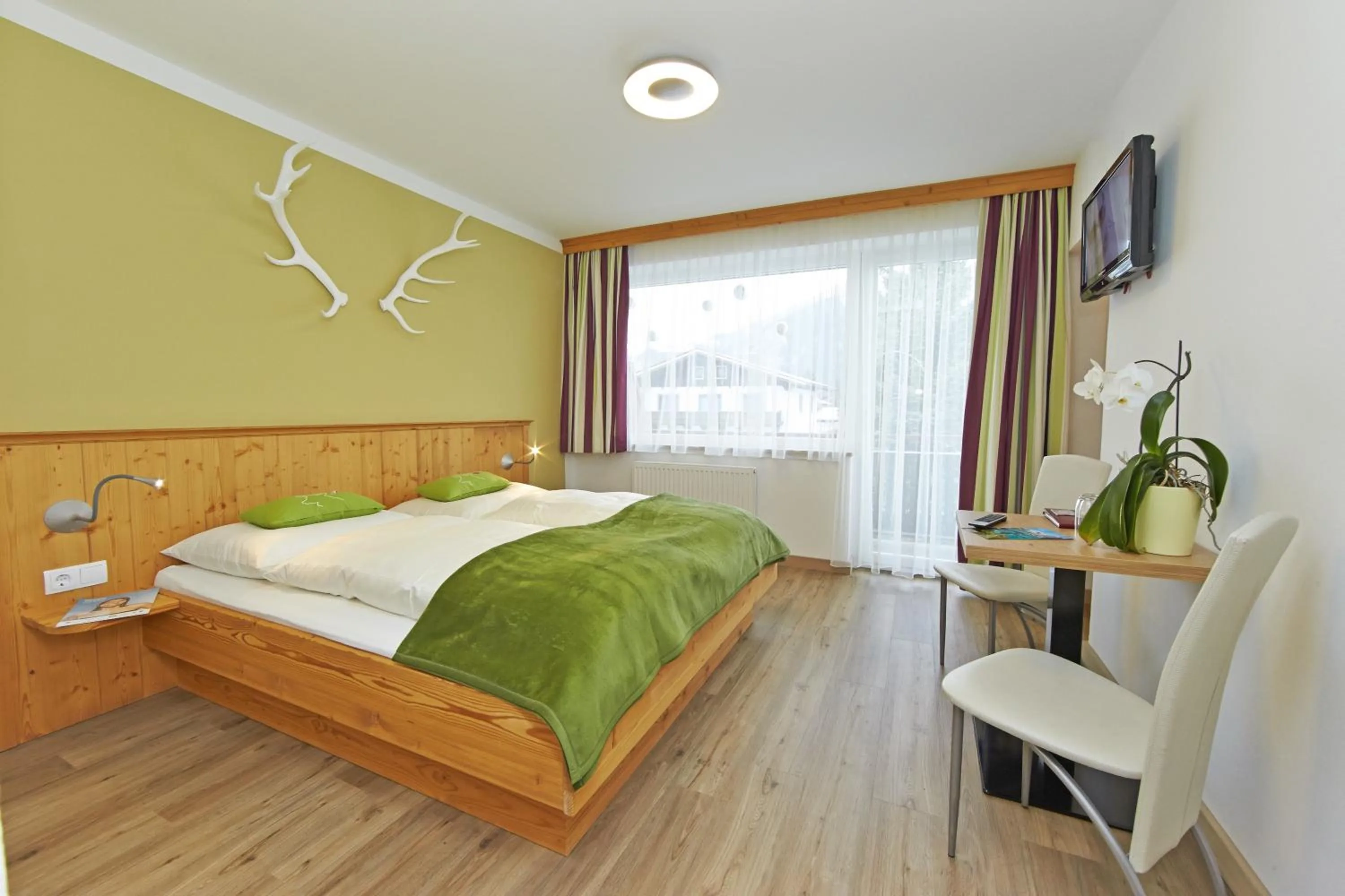 TV and multimedia, Bed in Comfort Hotel Garni Landhaus Gitti