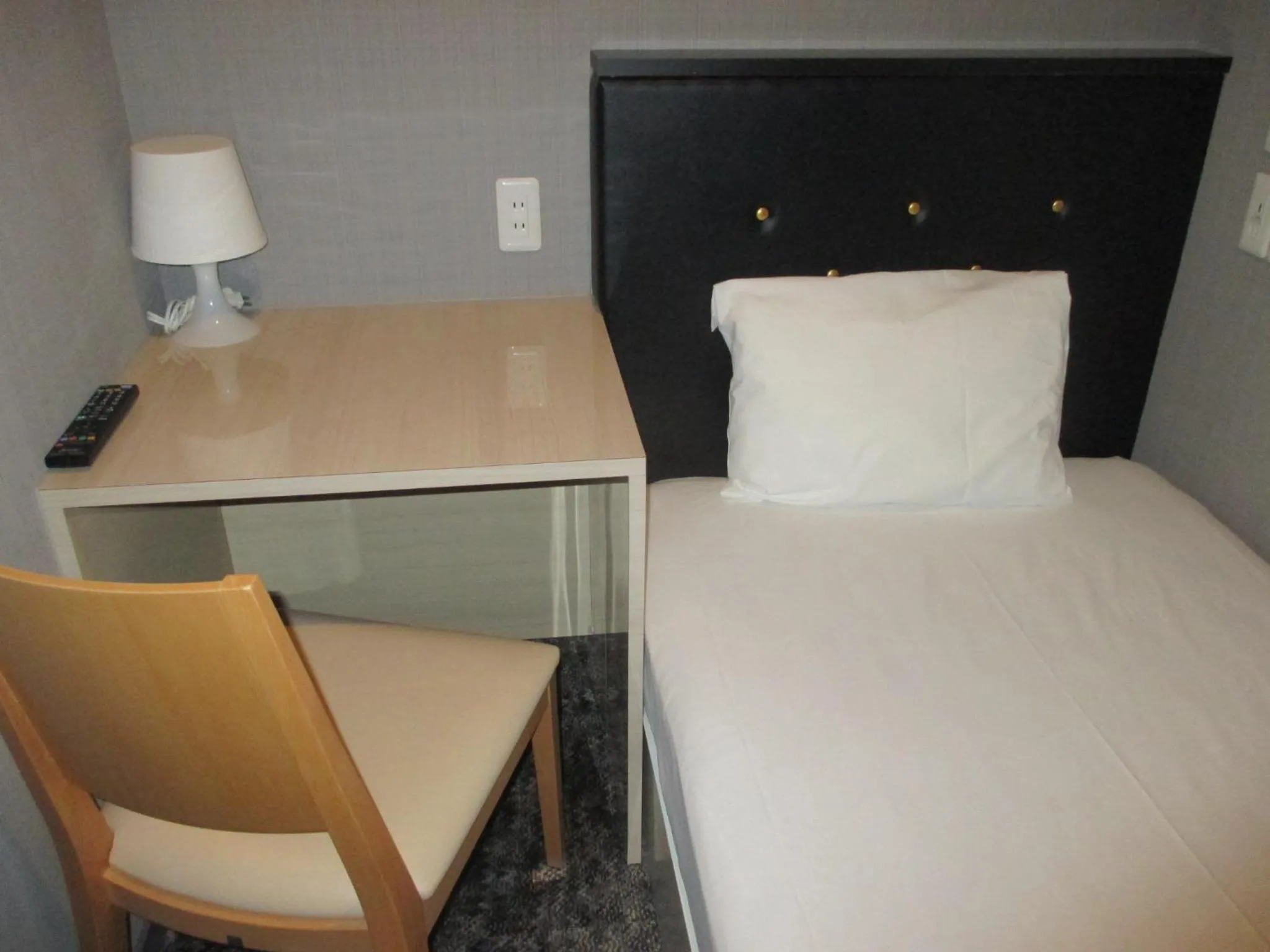 Bed in Hotel M Matsumoto