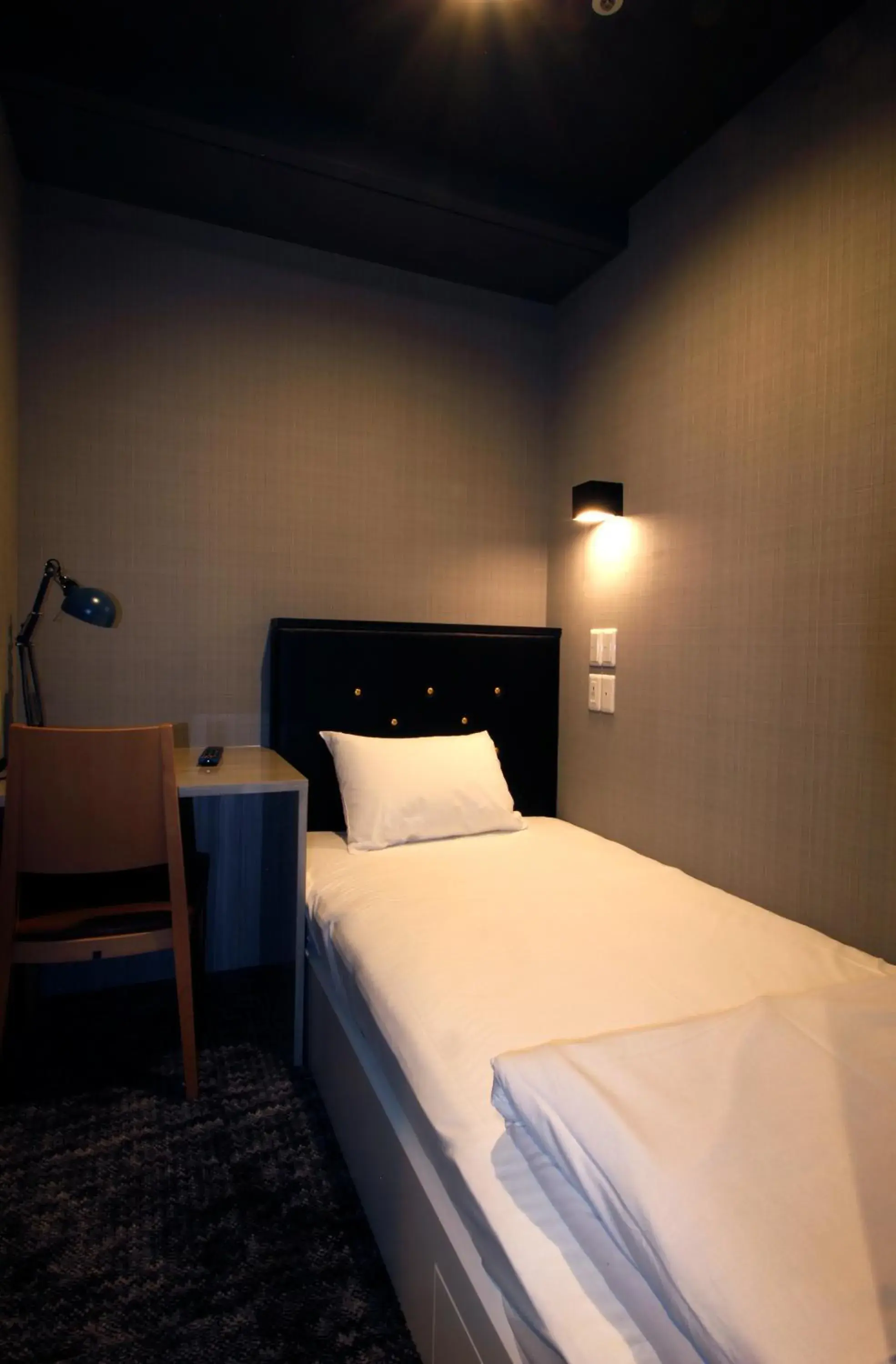Bed in Hotel M Matsumoto