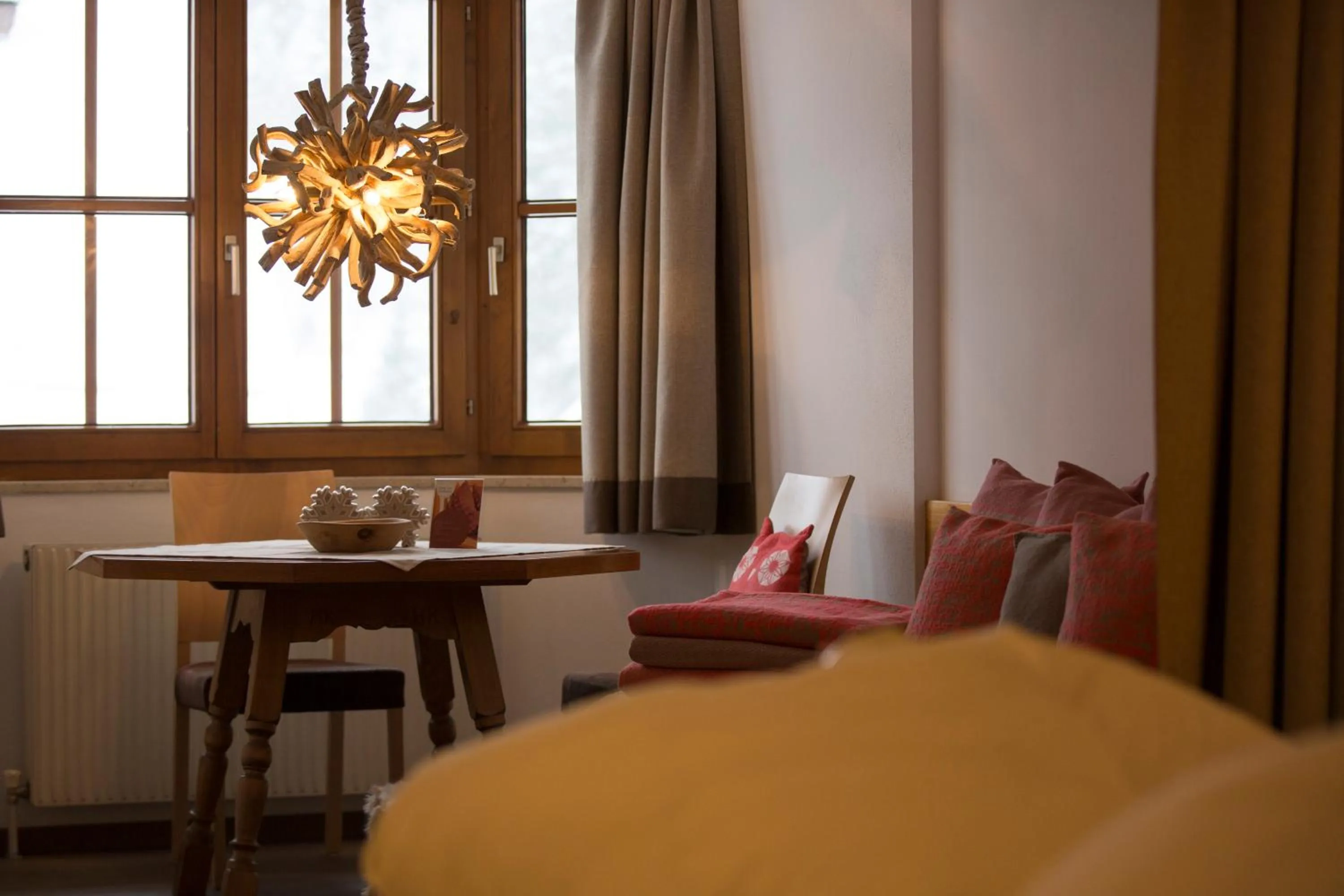 Seating area in AmDorfplatzSuites B&B- Adultsfriendly