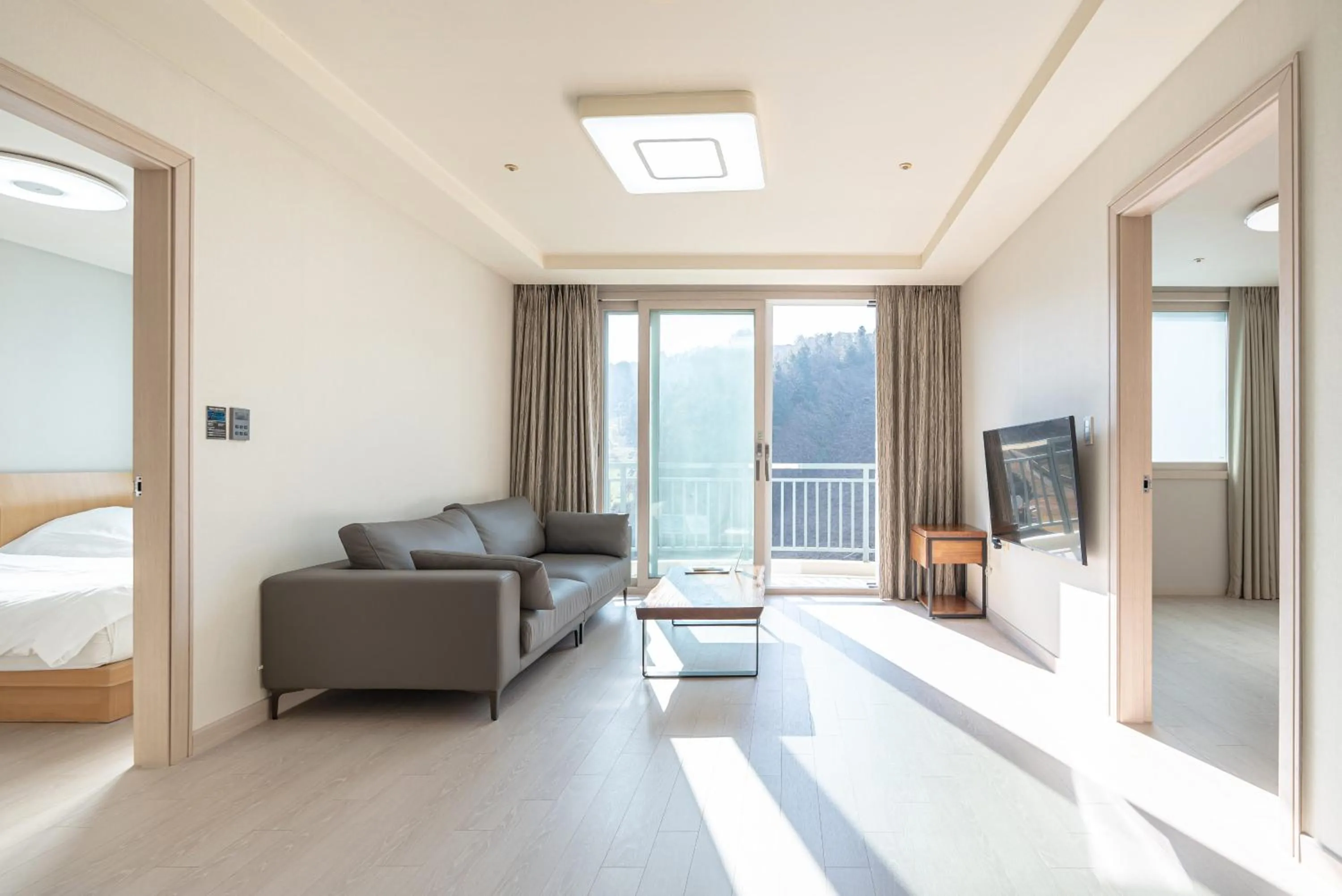 Living room, Bed in Elysian Gangchon Resort