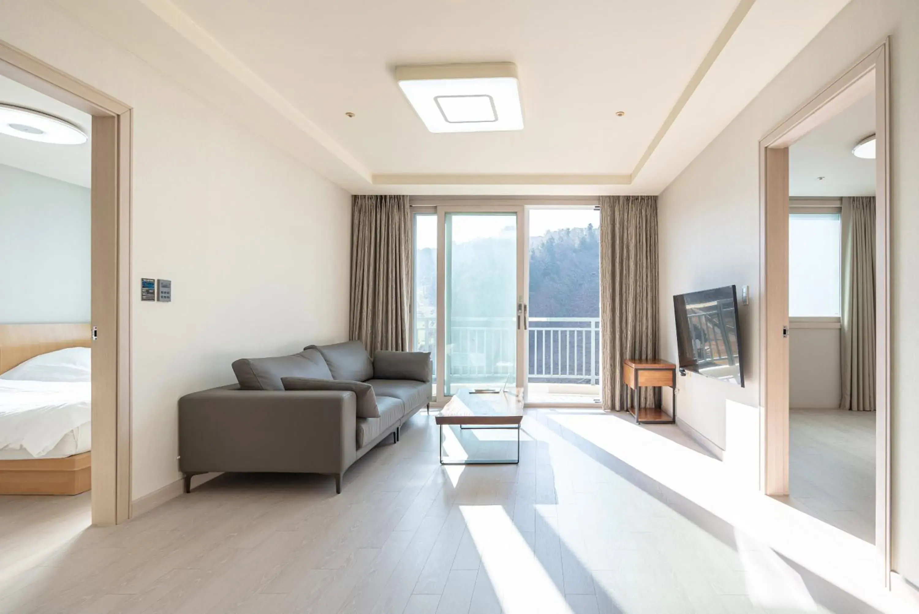 Living room, Bed in Elysian Gangchon Resort Living room, Bed in Elysian Gangchon Resort