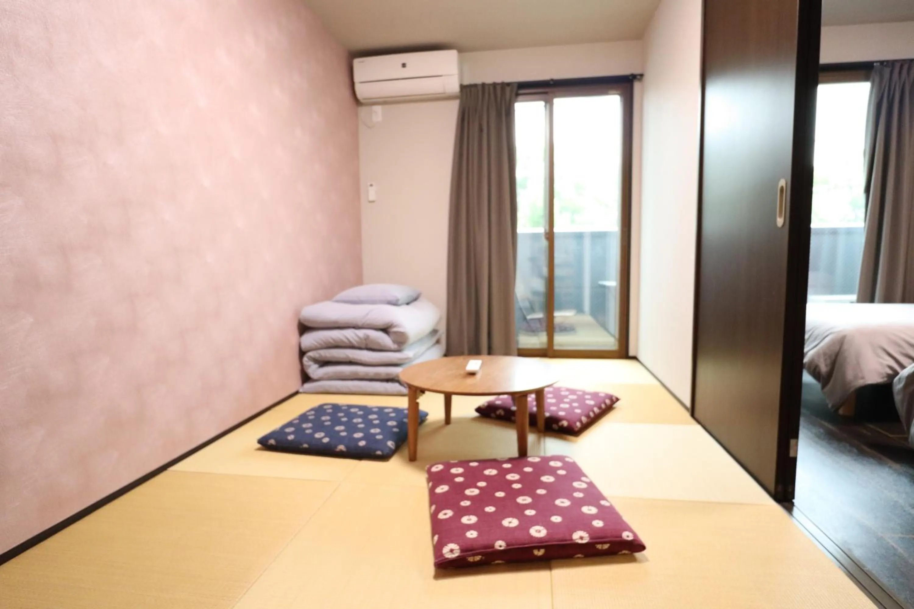 Bed in Kyostay Iroha Toji Annex
