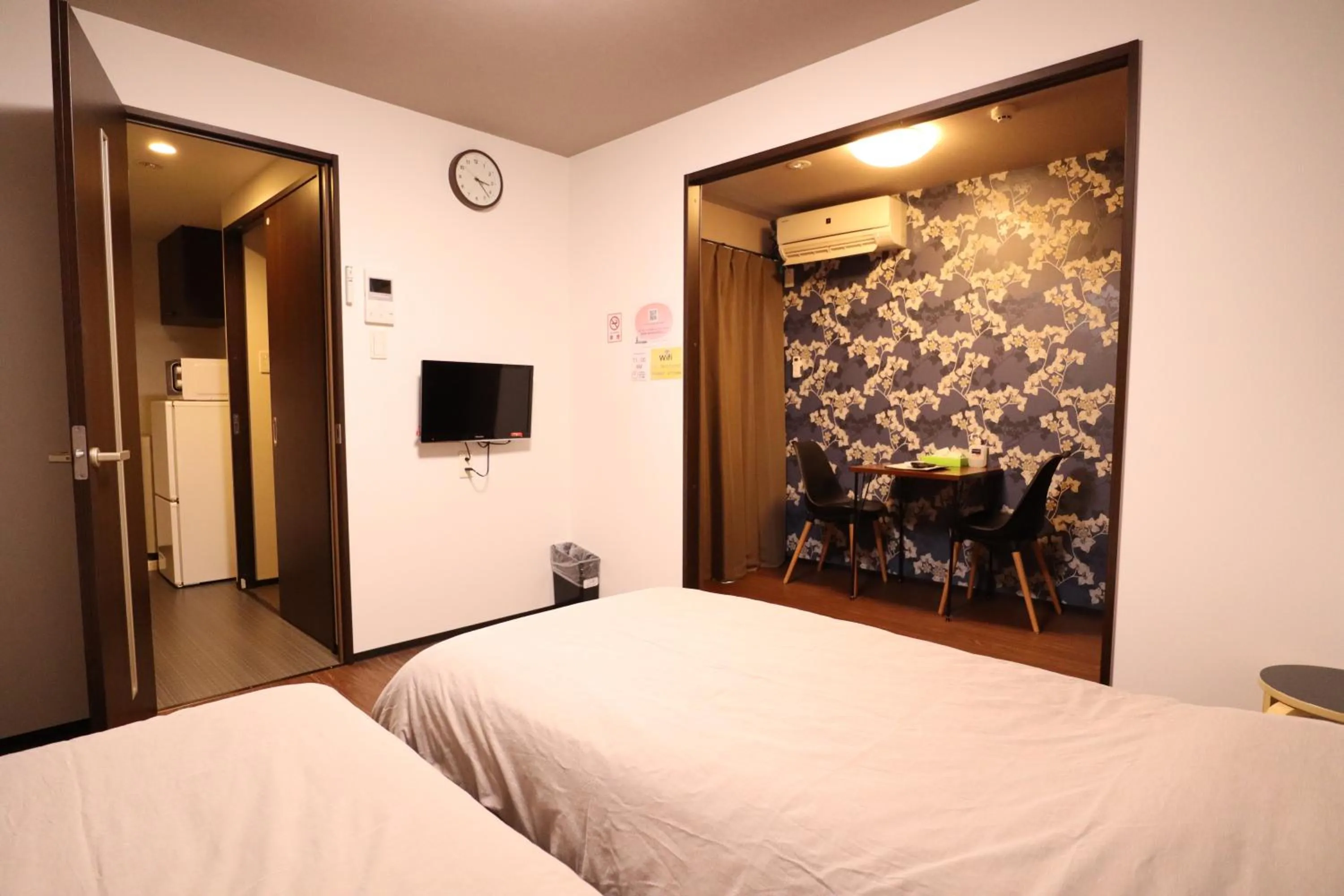 Bed in Kyostay Iroha Toji Annex