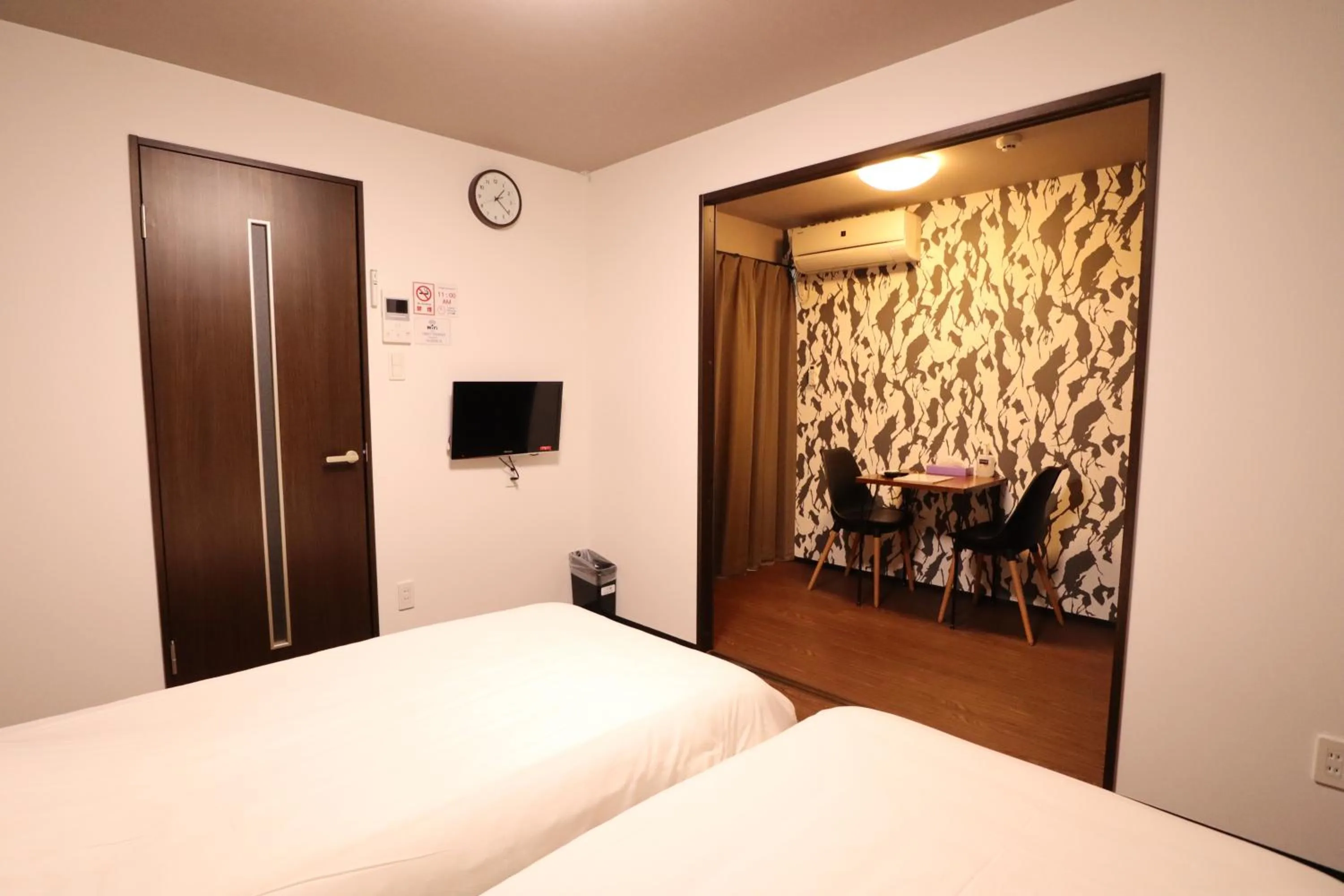 Bed in Kyostay Iroha Toji Annex