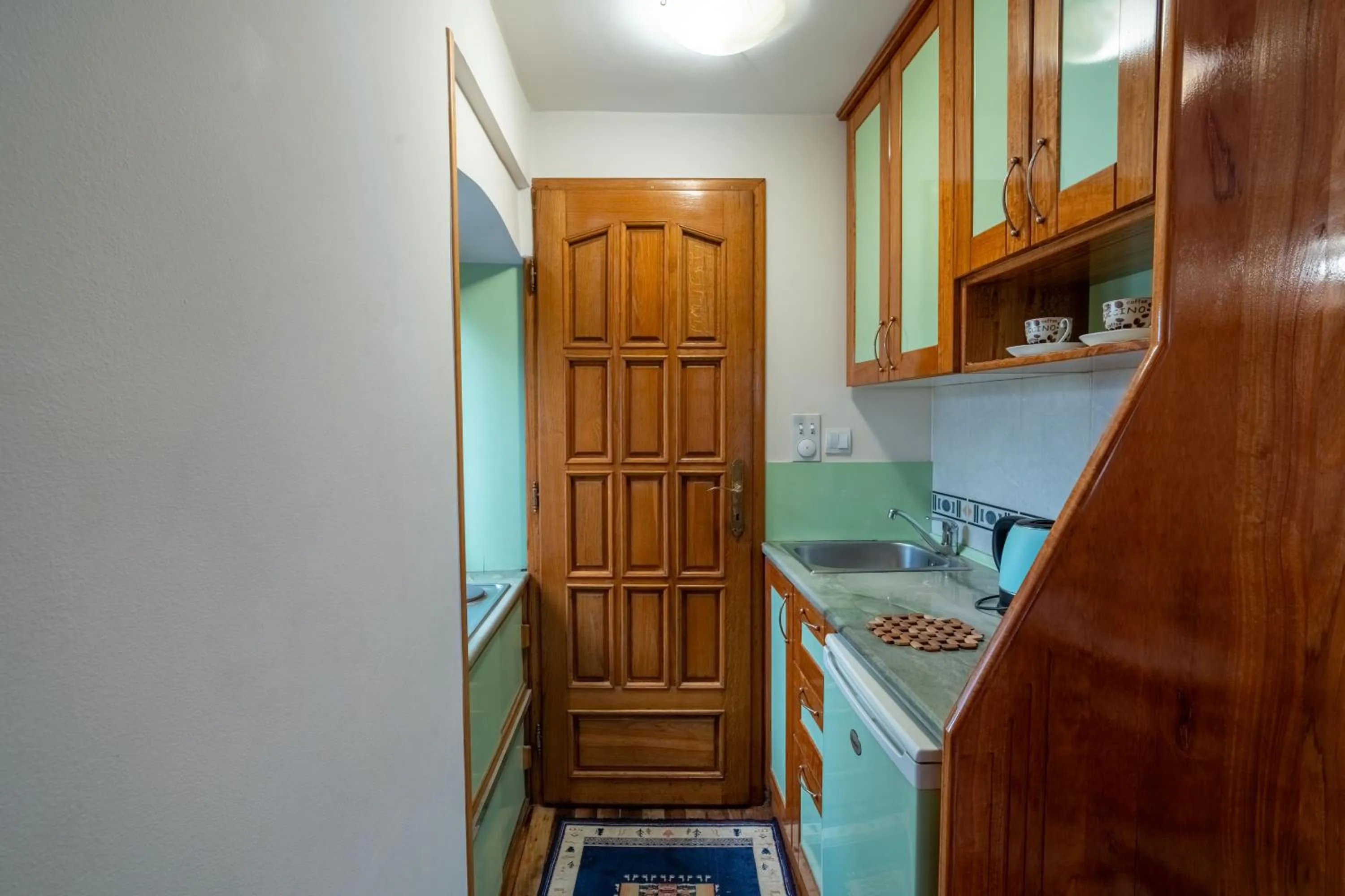 Kitchen or kitchenette in Studios Belvi