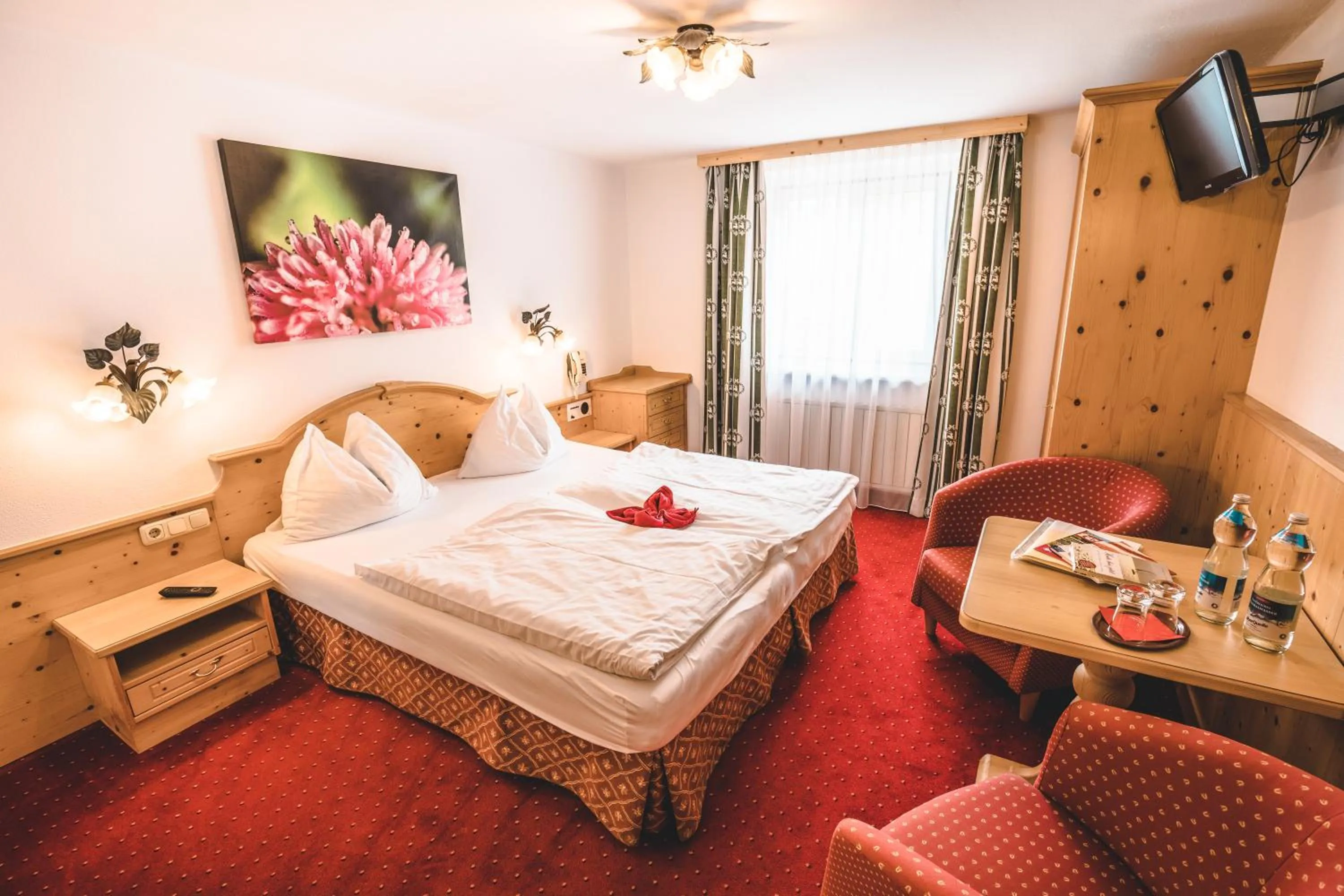 Seating area, Bed in Hotel Metzgerwirt