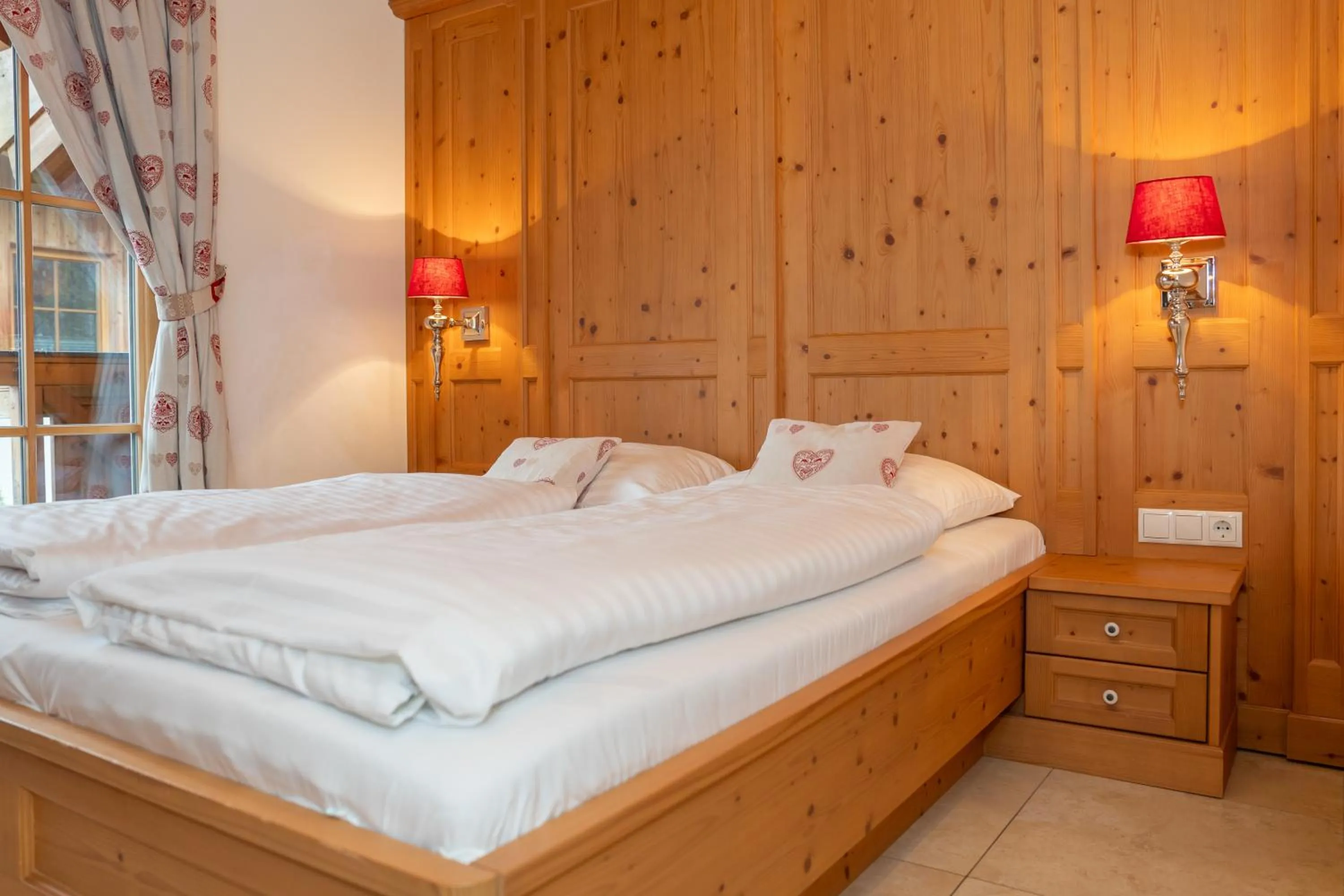 Bed in AvenidA Panorama Chalet by Alpin Rentals