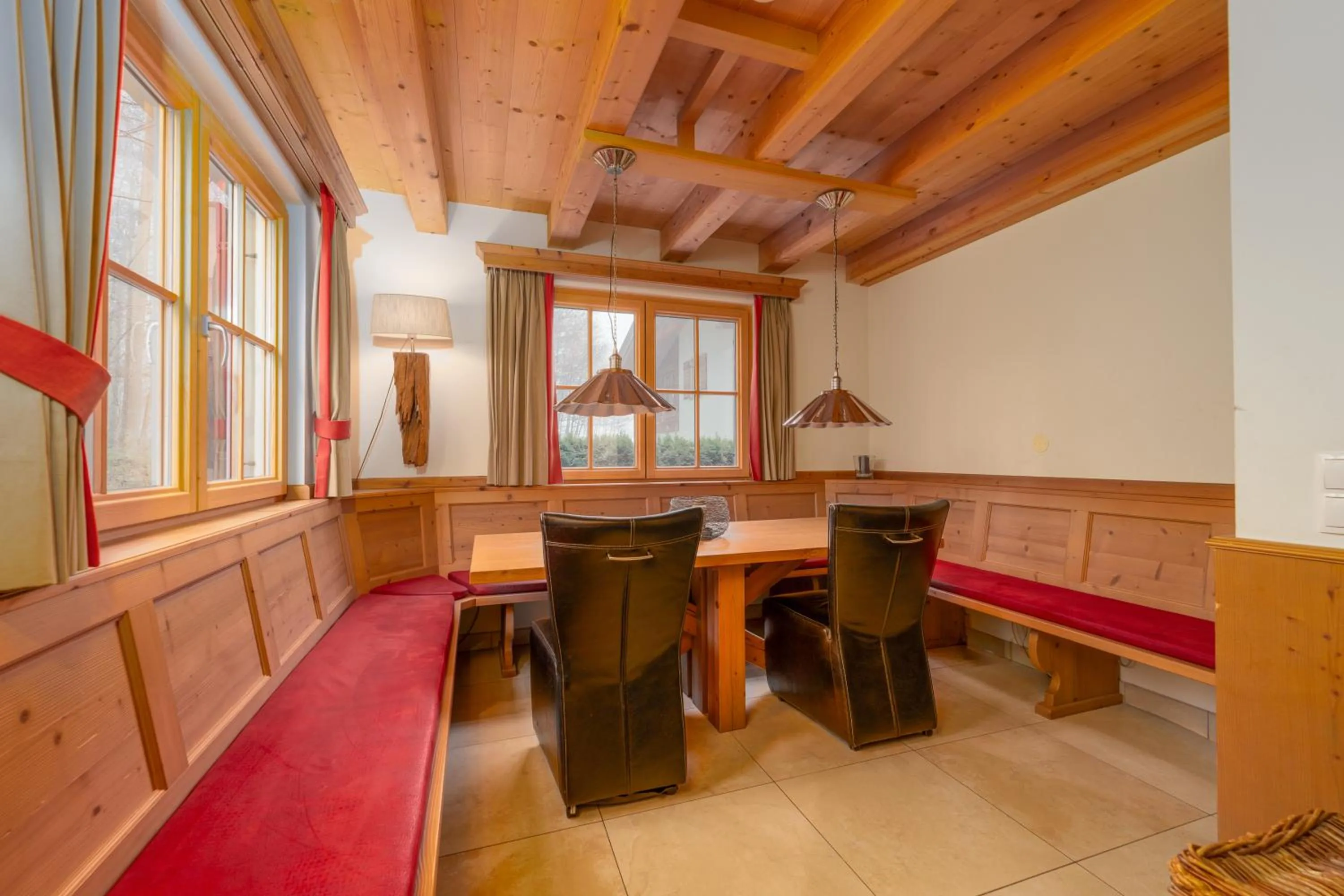 Seating area in AvenidA Panorama Chalet by Alpin Rentals
