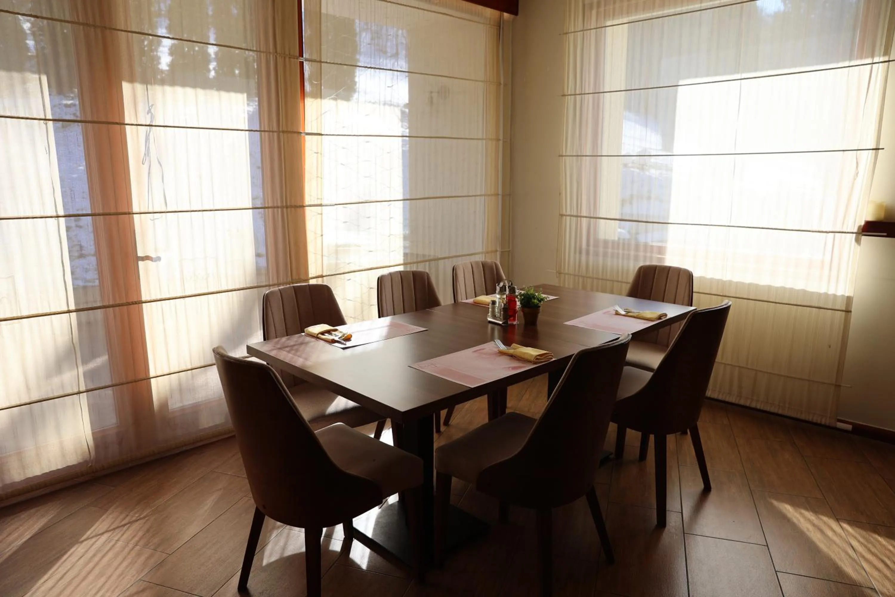 Dining area in Hotel Happy