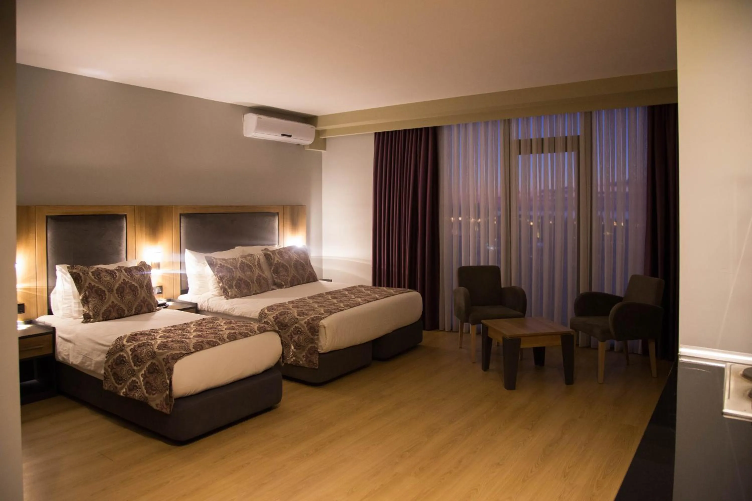 Photo of the whole room, Bed in Euphoria Batumi Convention & Casino Hotel