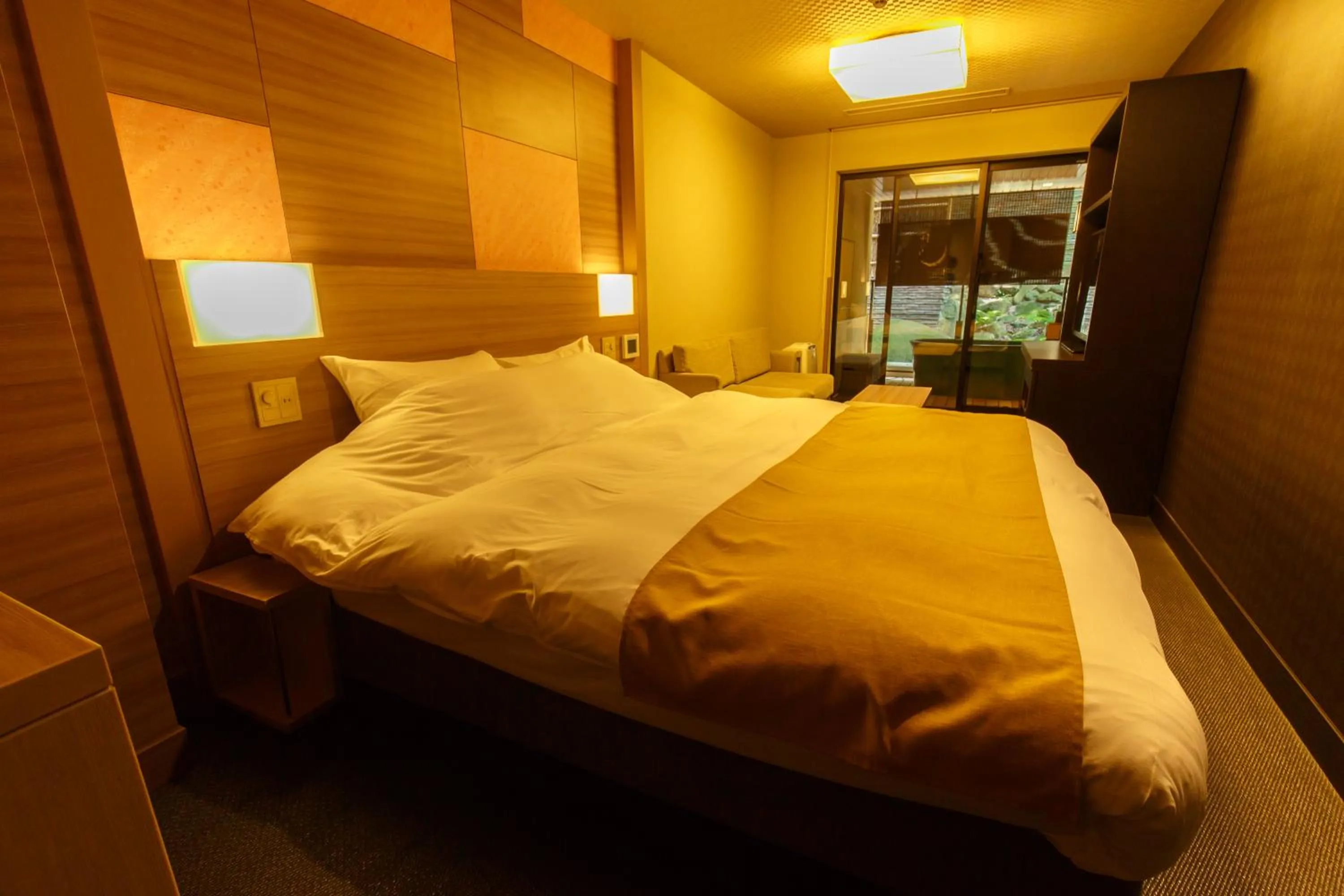 Bed in Tsukino Yado Sara