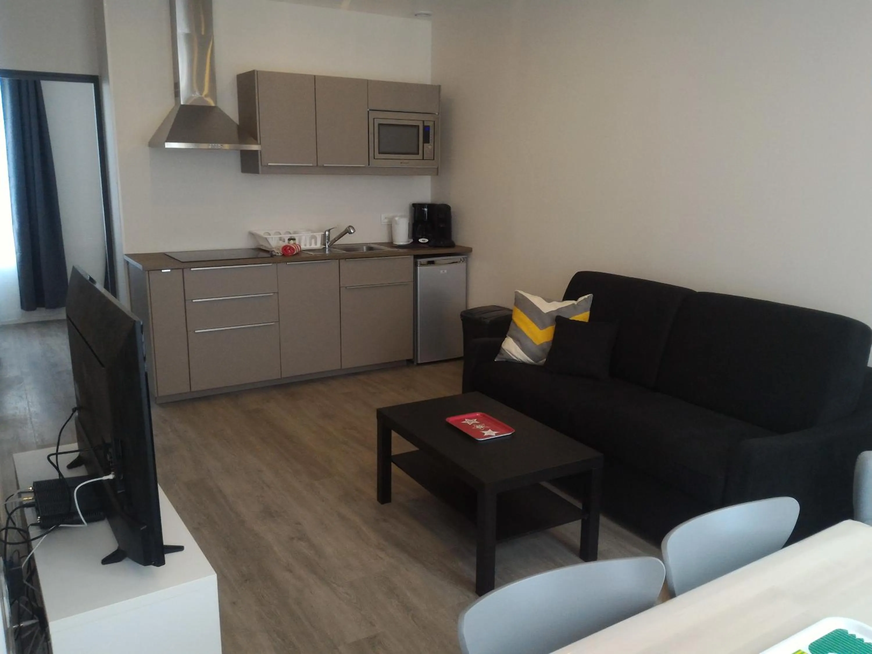 Kitchen or kitchenette in Sohosuite