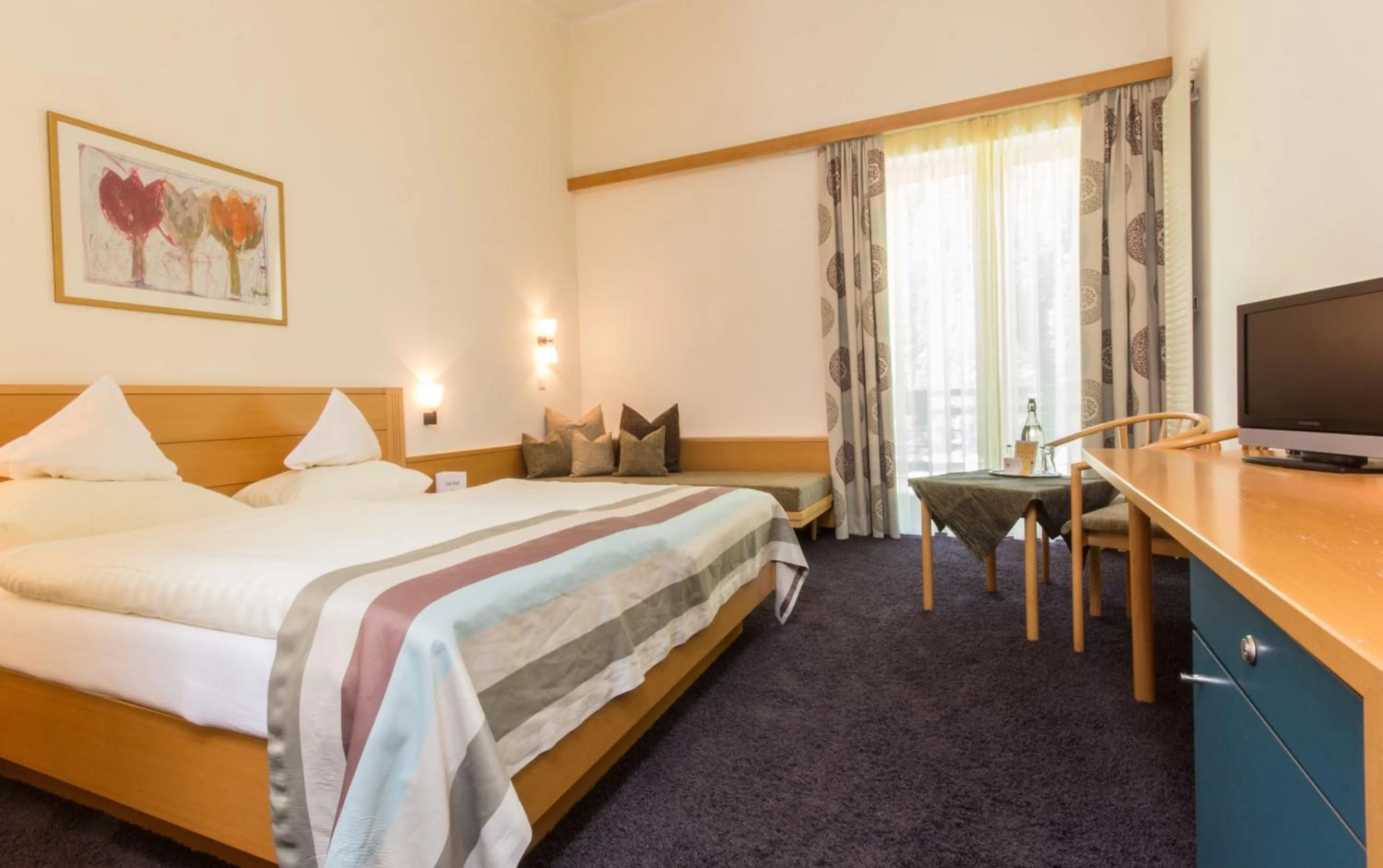 Bed in Hotel Vier Jahreszeiten