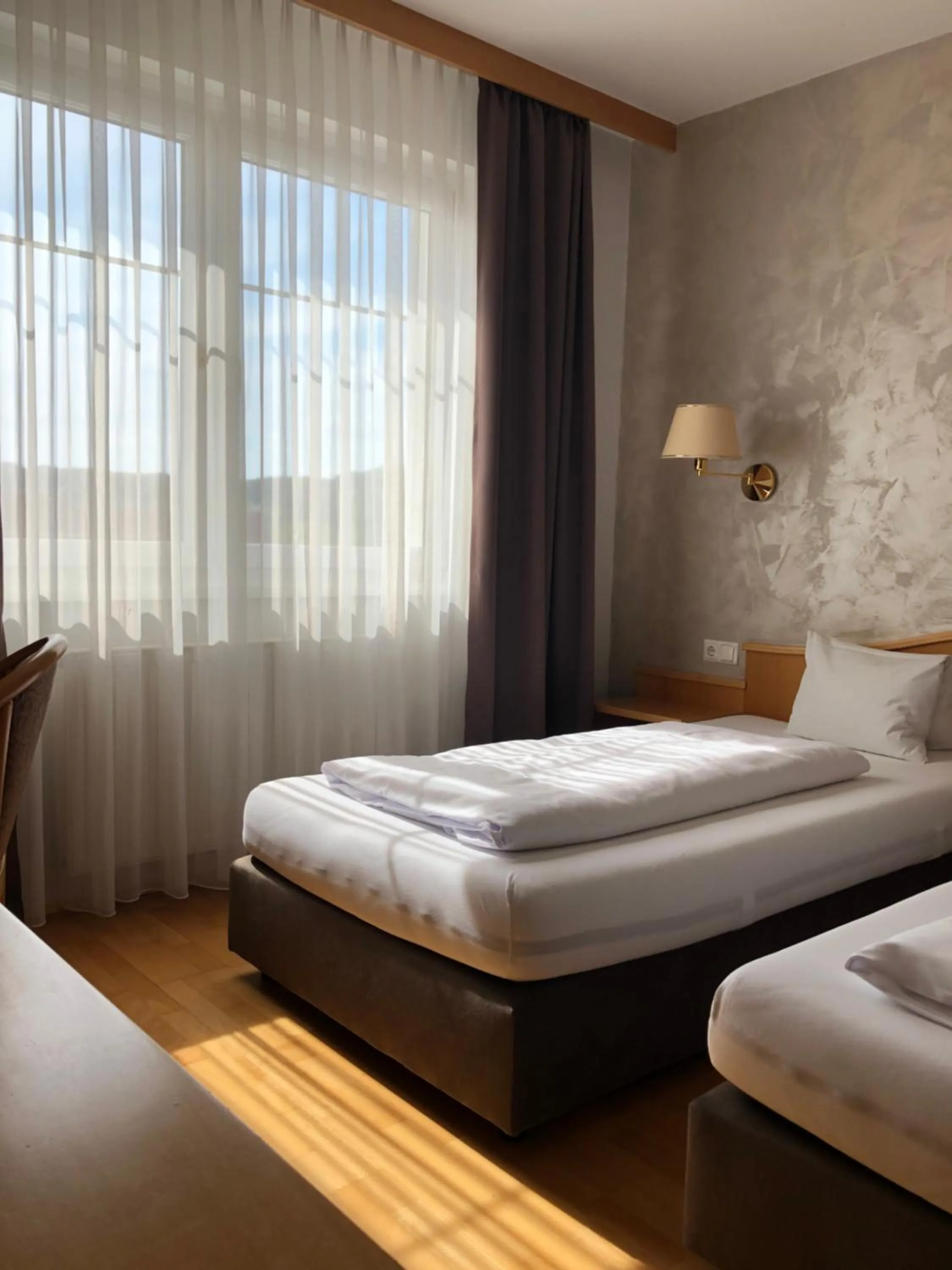 Bed in Stadthotel GARNI Pinkafeld