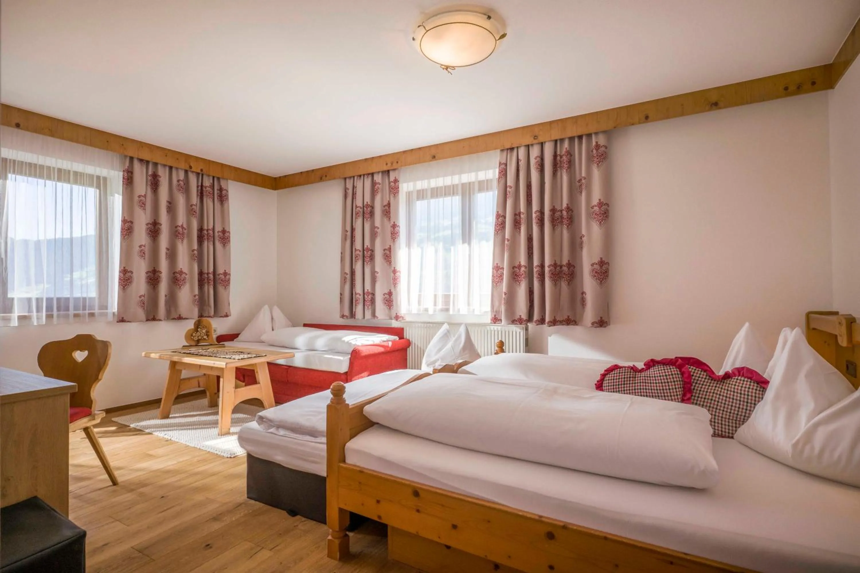 Photo of the whole room, Bed in Hotel Landhaus Zillertal