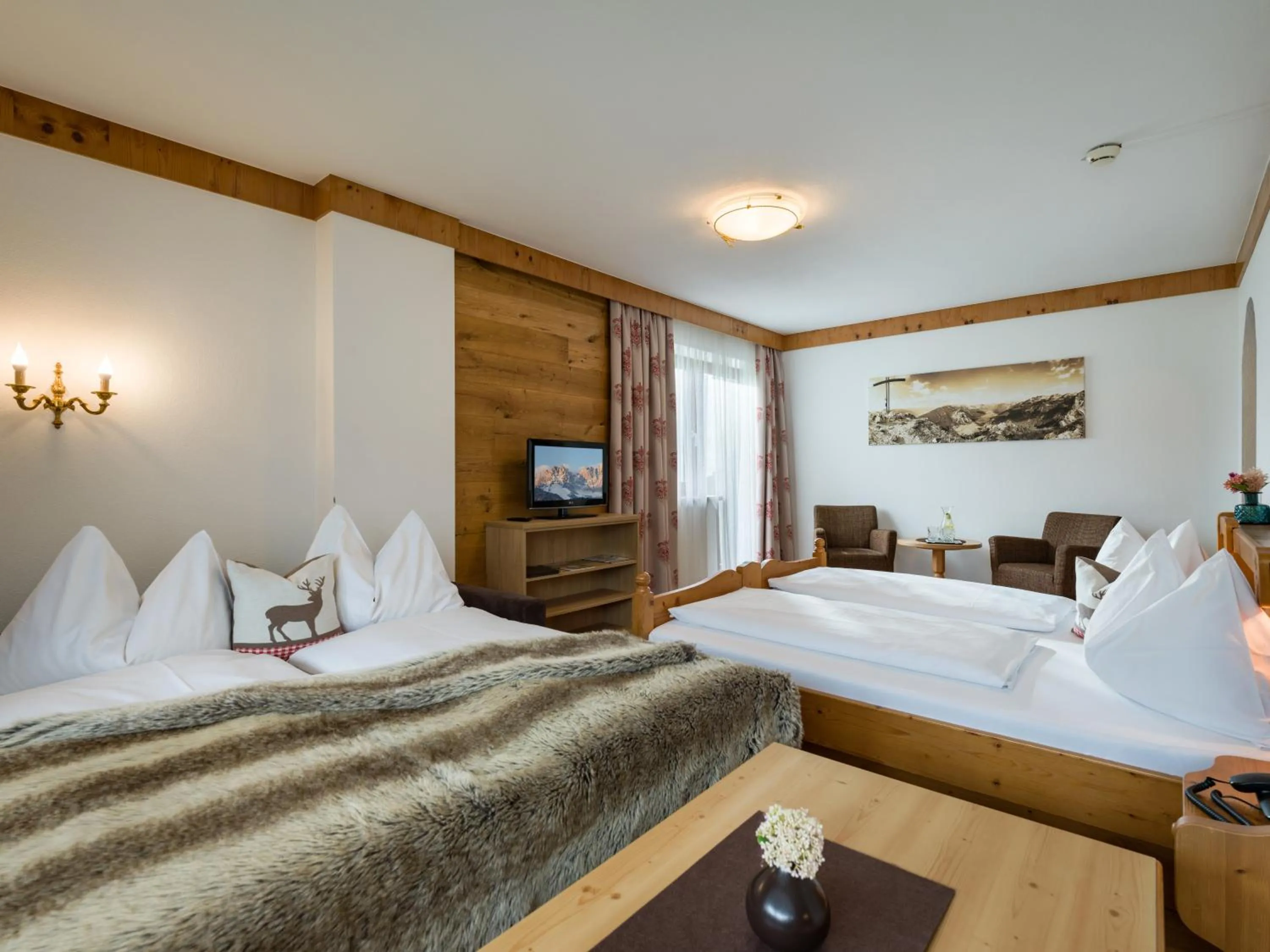 Photo of the whole room, Bed in Hotel Landhaus Zillertal