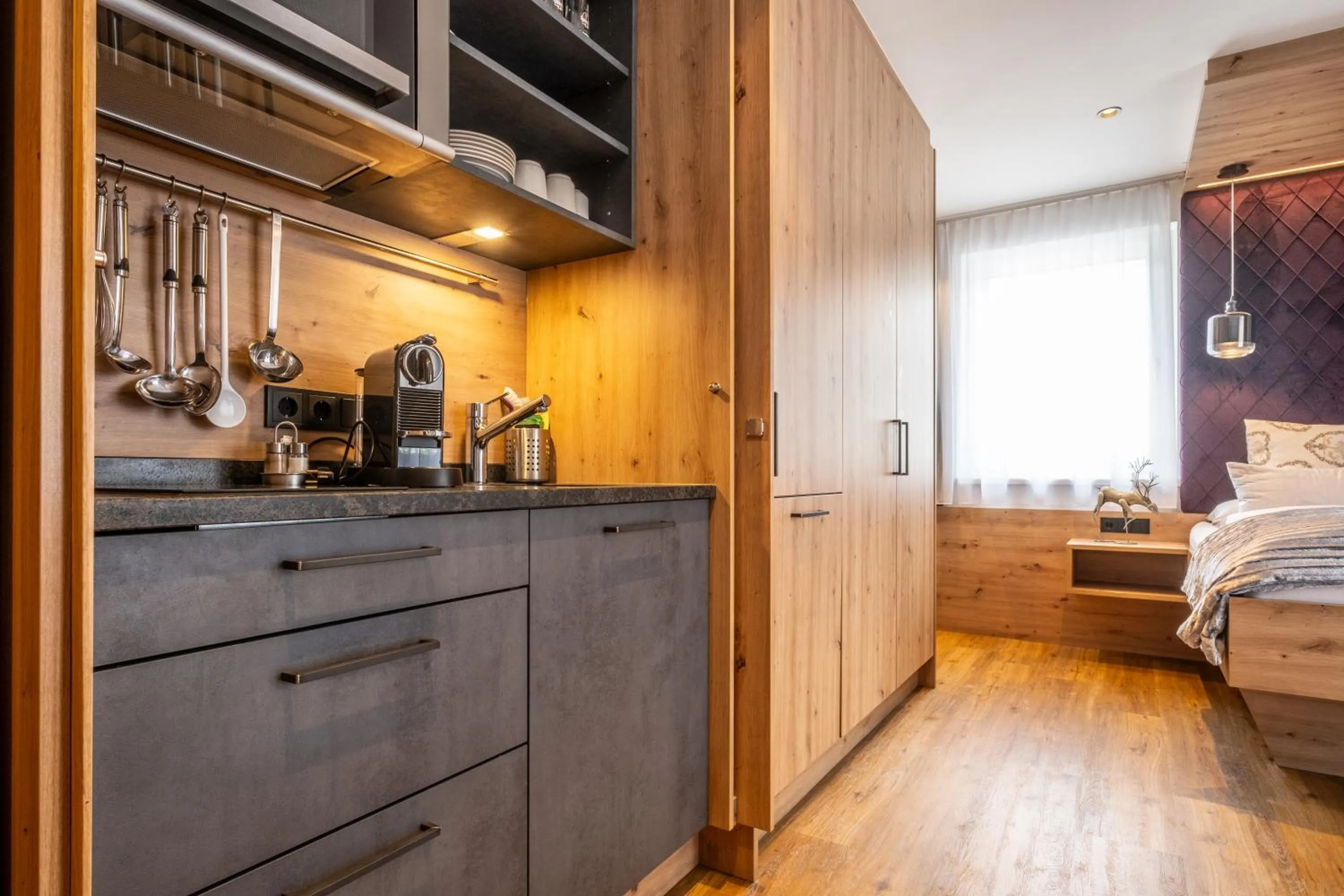 Kitchen or kitchenette in Dorfkrug Kaprun - Luxury Suites & Appartements