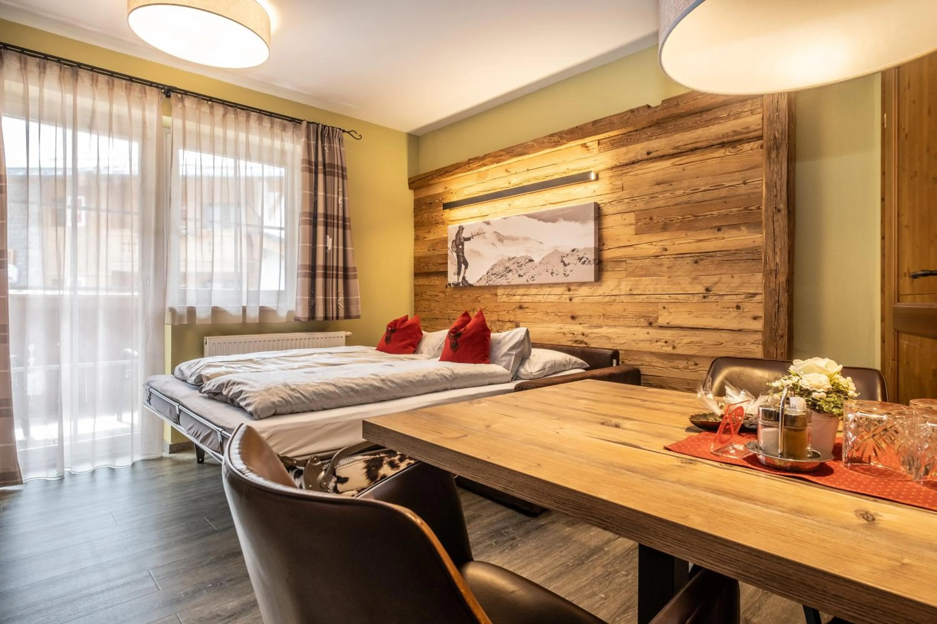 Bed in Dorfkrug Kaprun - Luxury Suites & Appartements