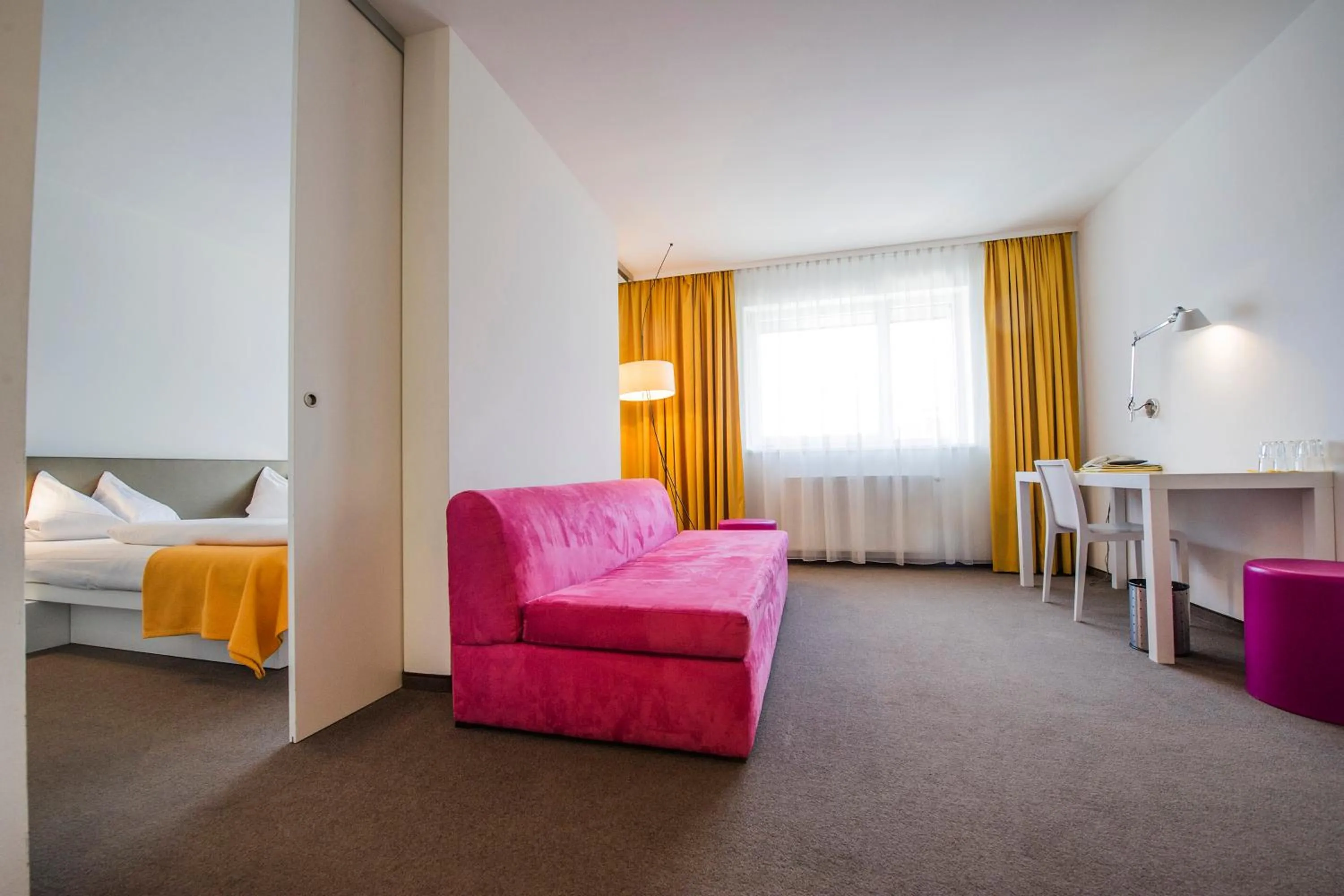 Living room, Bed in STAY.inn Comfort Art Hotel Schwaz