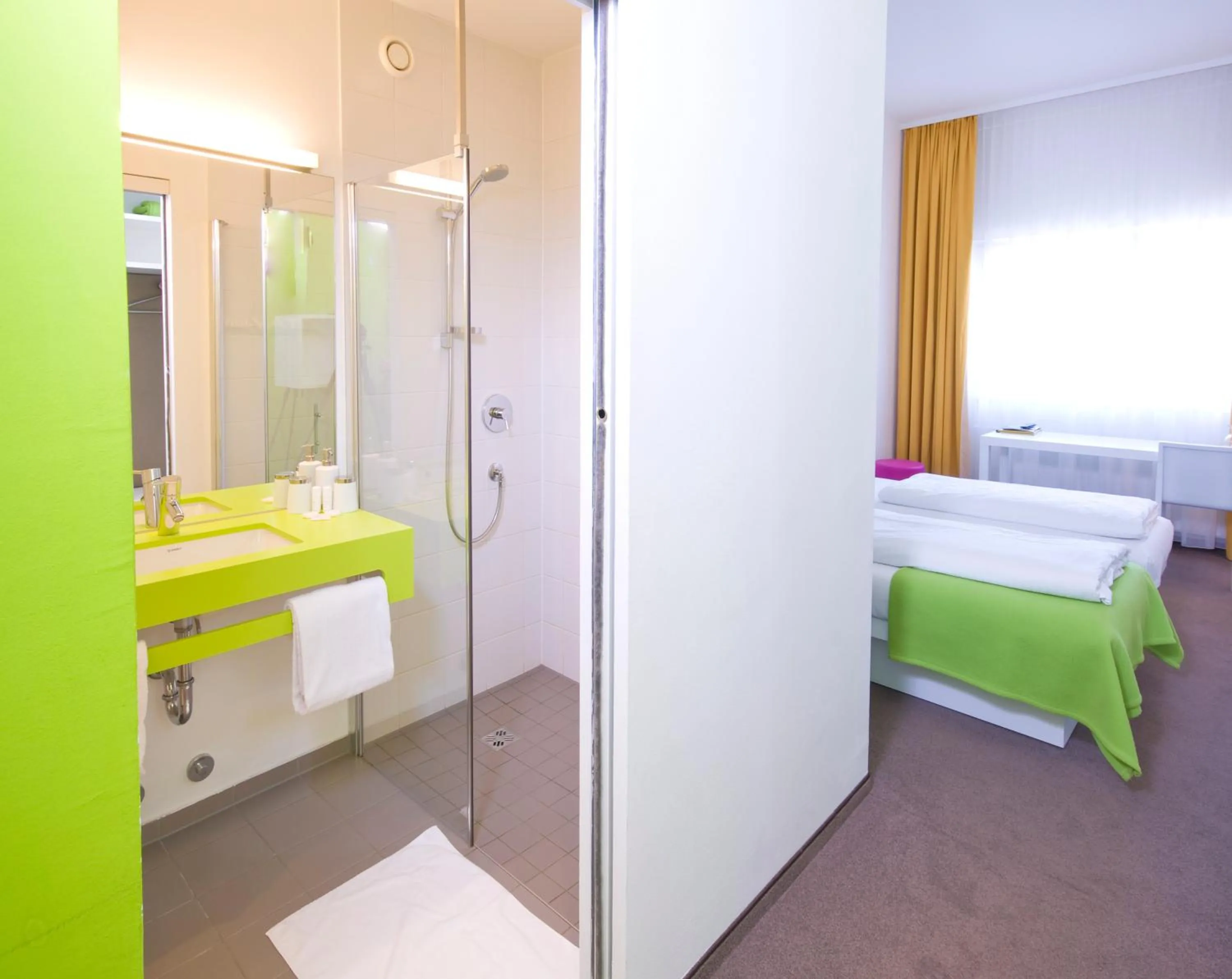 Bathroom, Bed in STAY.inn Comfort Art Hotel Schwaz