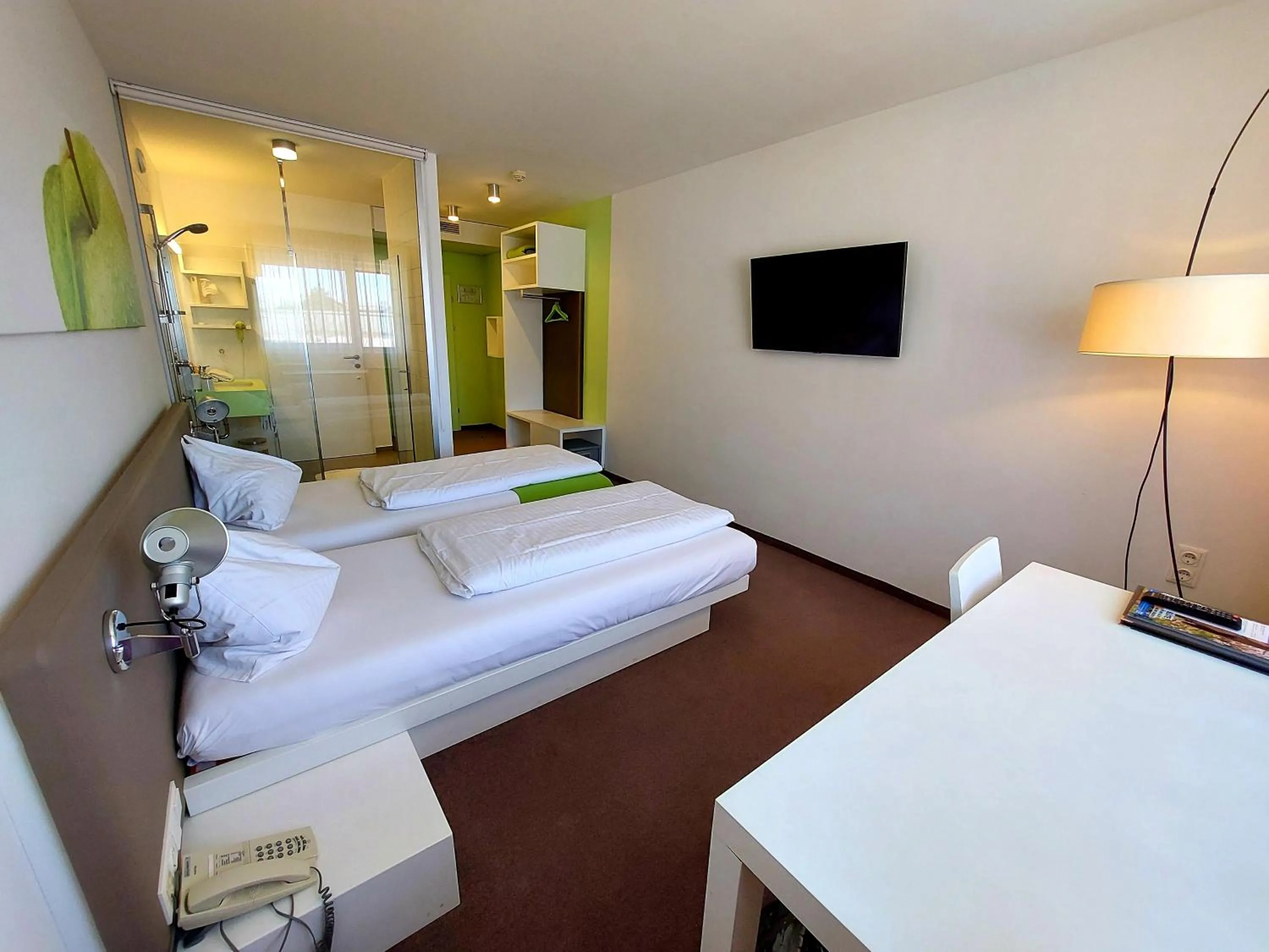 Bed in STAY.inn Comfort Art Hotel Schwaz