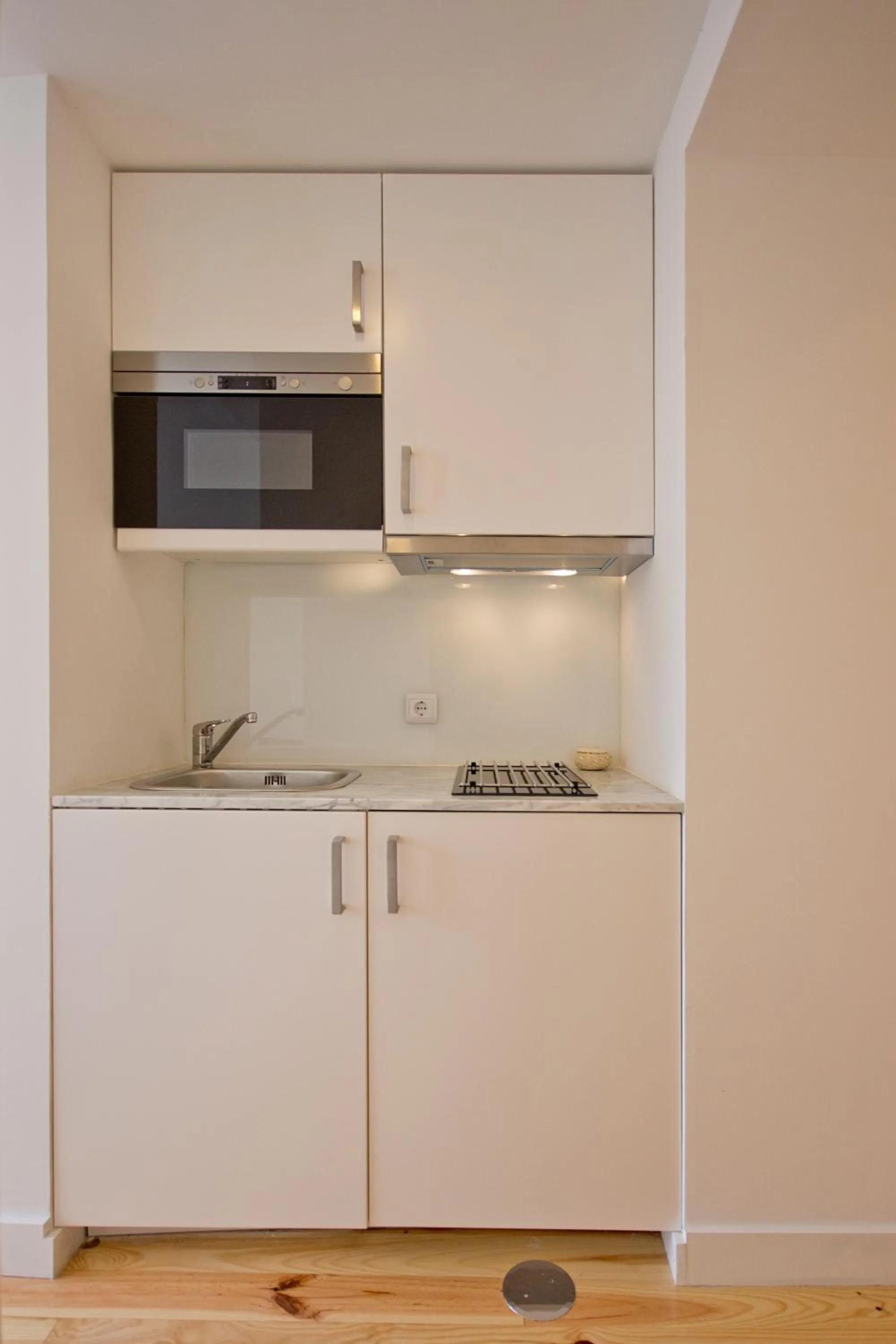 Kitchen or kitchenette in MyStay Porto Bolhão