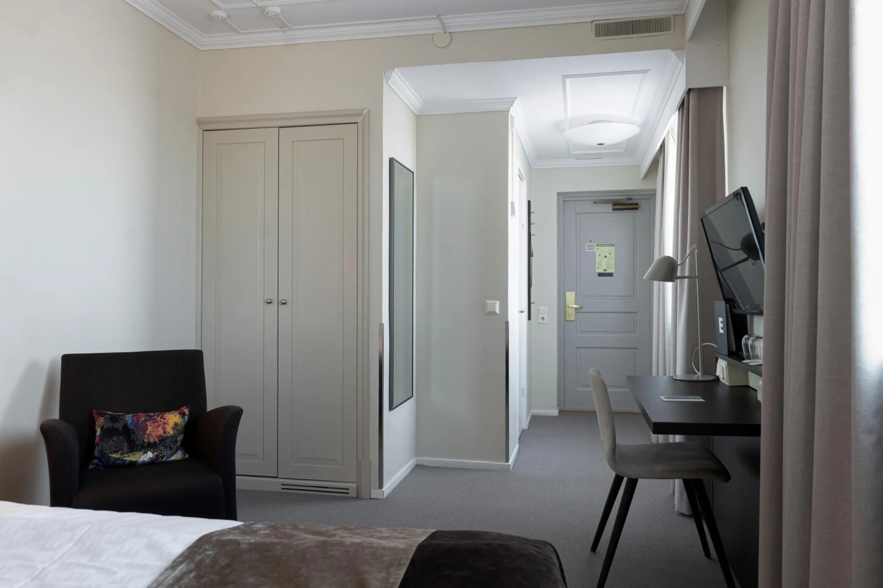 Photo of the whole room, Bed in Elite Stadshotellet Luleå