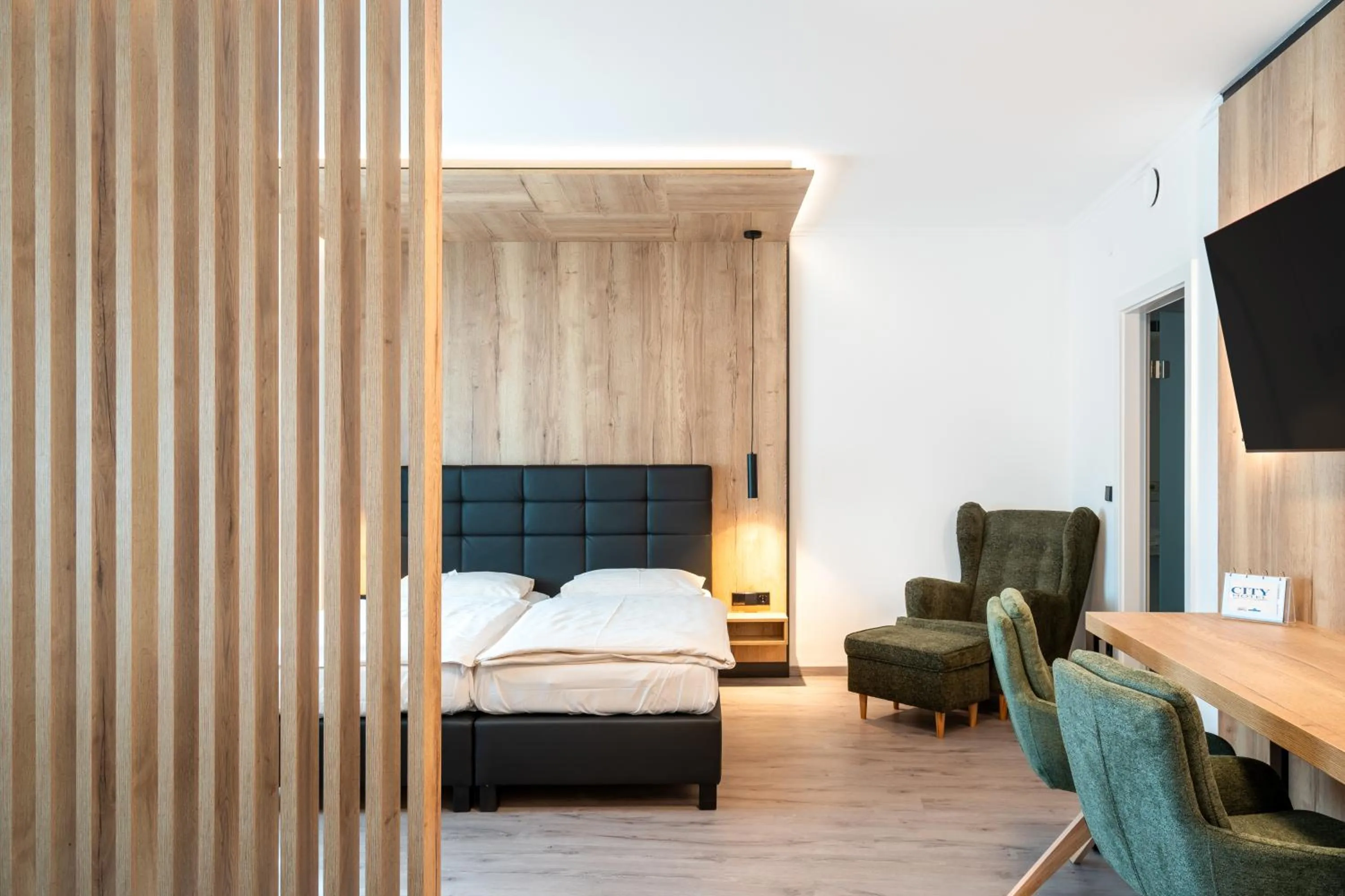 Bed in City Hotel Stockerau