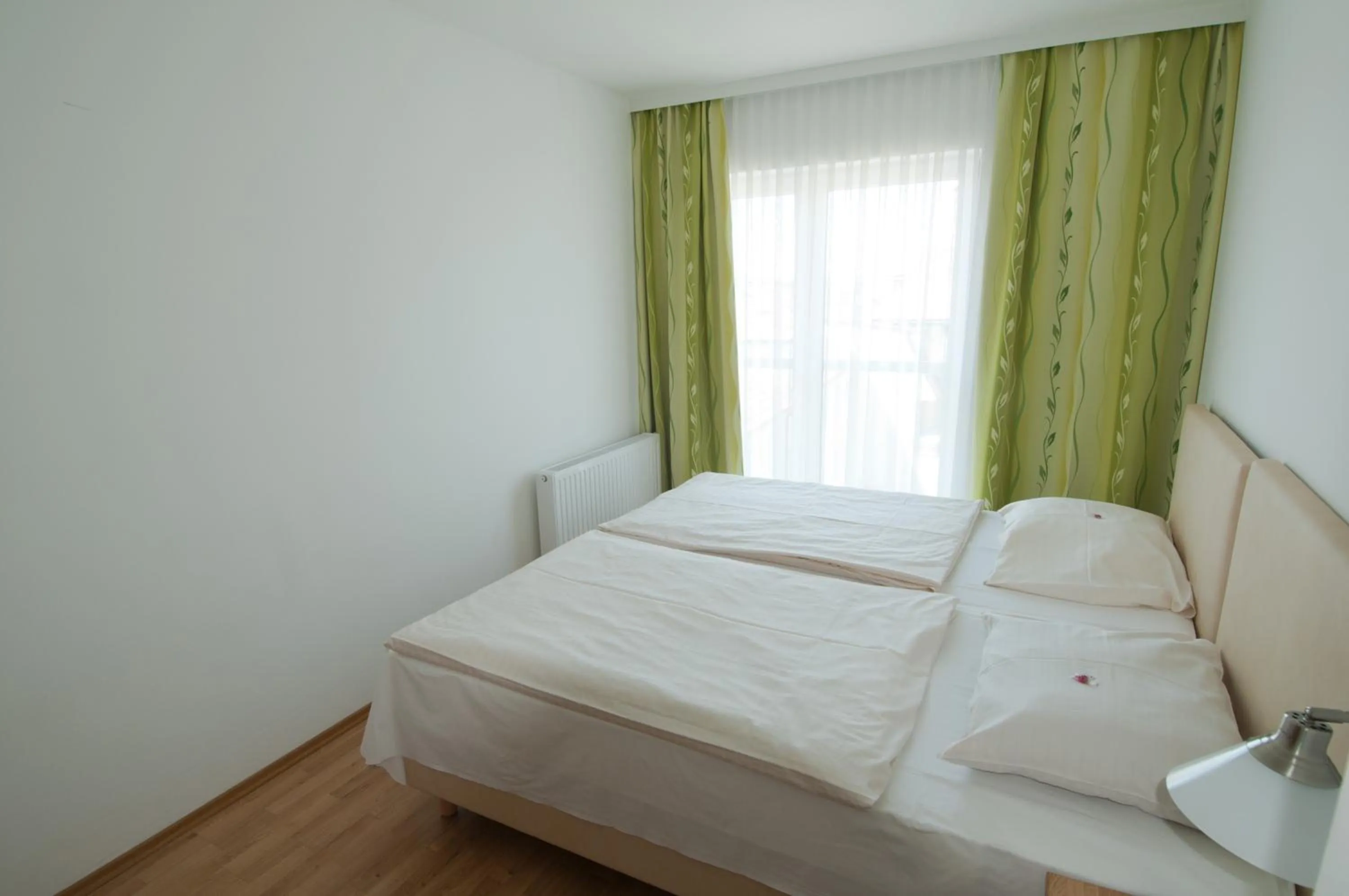 Bed in City Hotel Stockerau