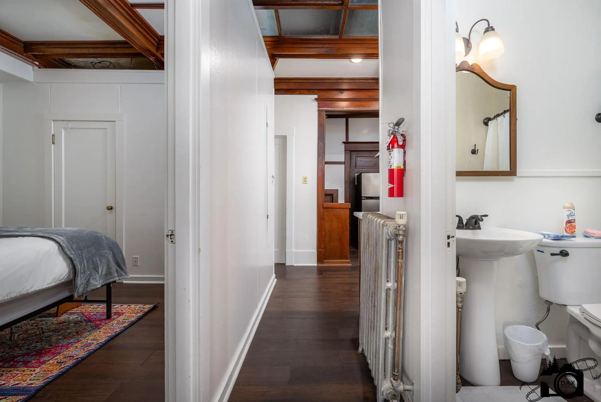 Bed in Brown & Hawkins Historical Apartments