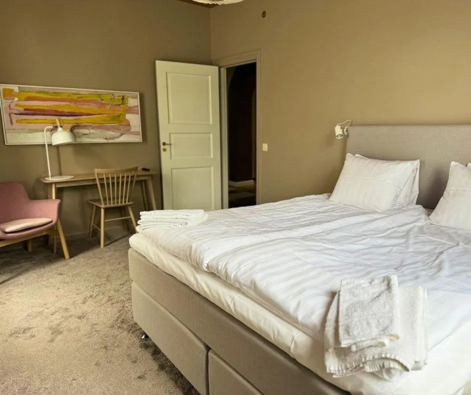 Photo of the whole room, Bed in Eksjö Stadshotell
