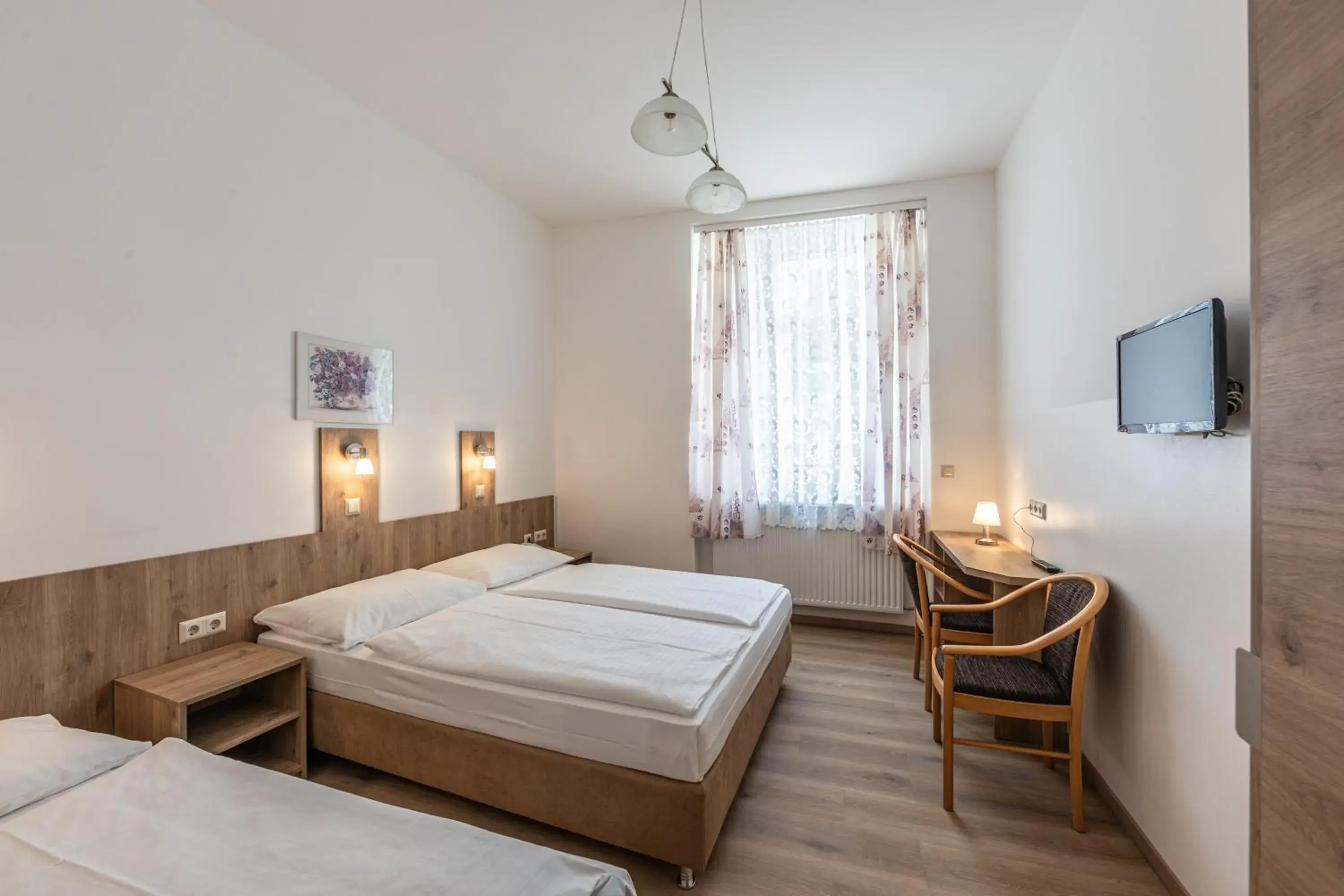 Triple Room in Hotel Terminus Triple Room in Hotel Terminus