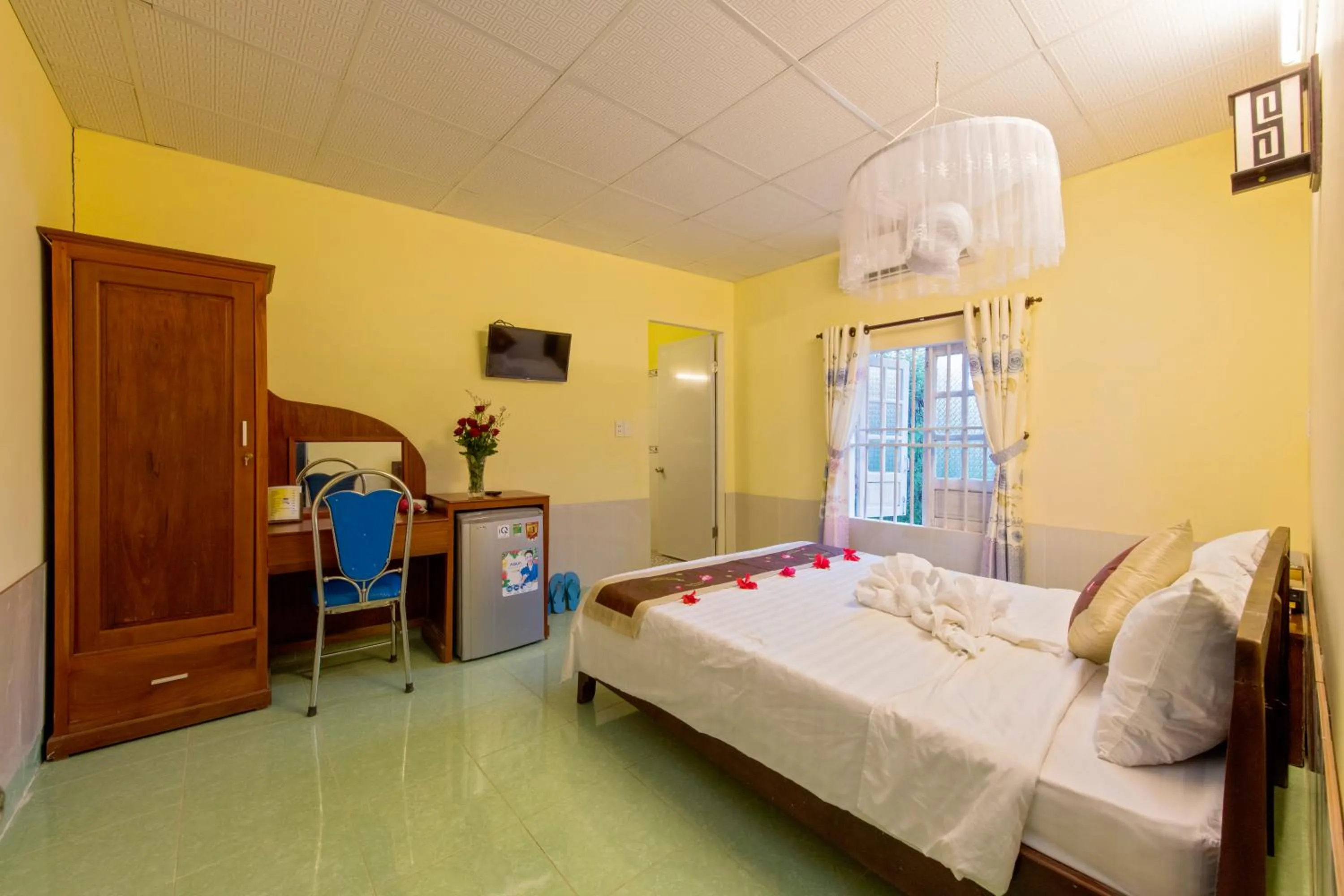 Bed in Bougain Villeas Homestay