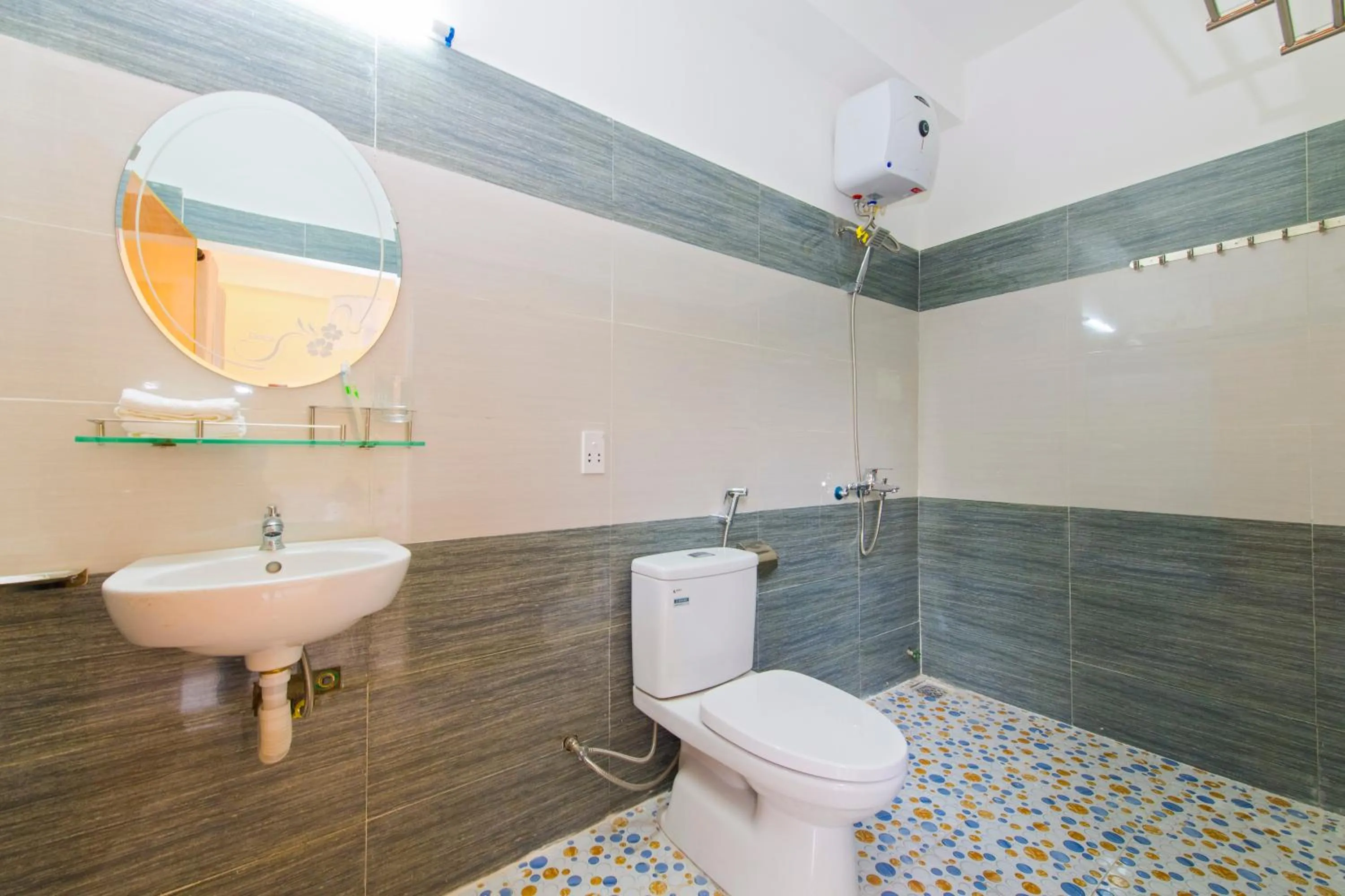 Bathroom in Bougain Villeas Homestay