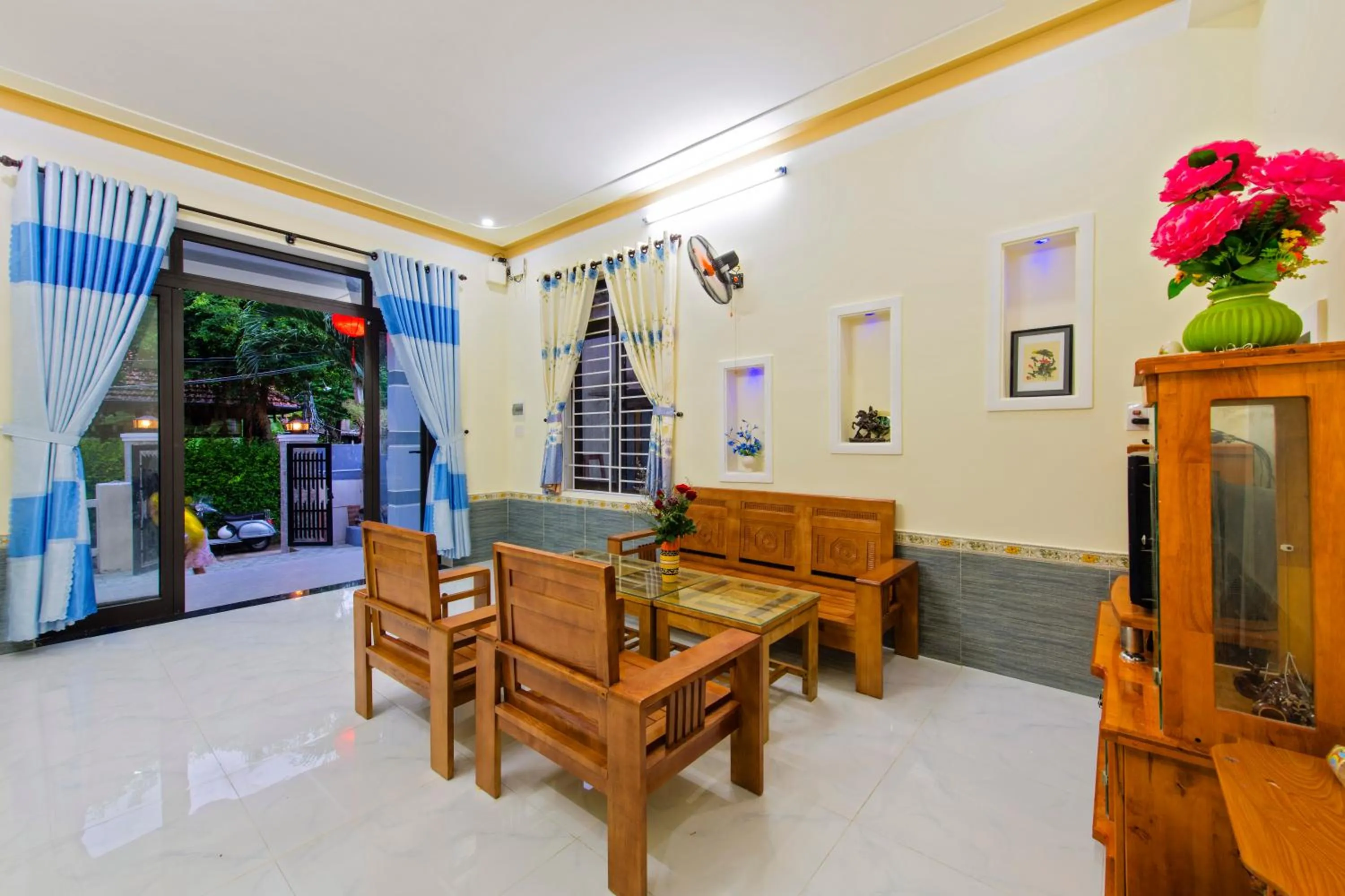 Seating area in Bougain Villeas Homestay