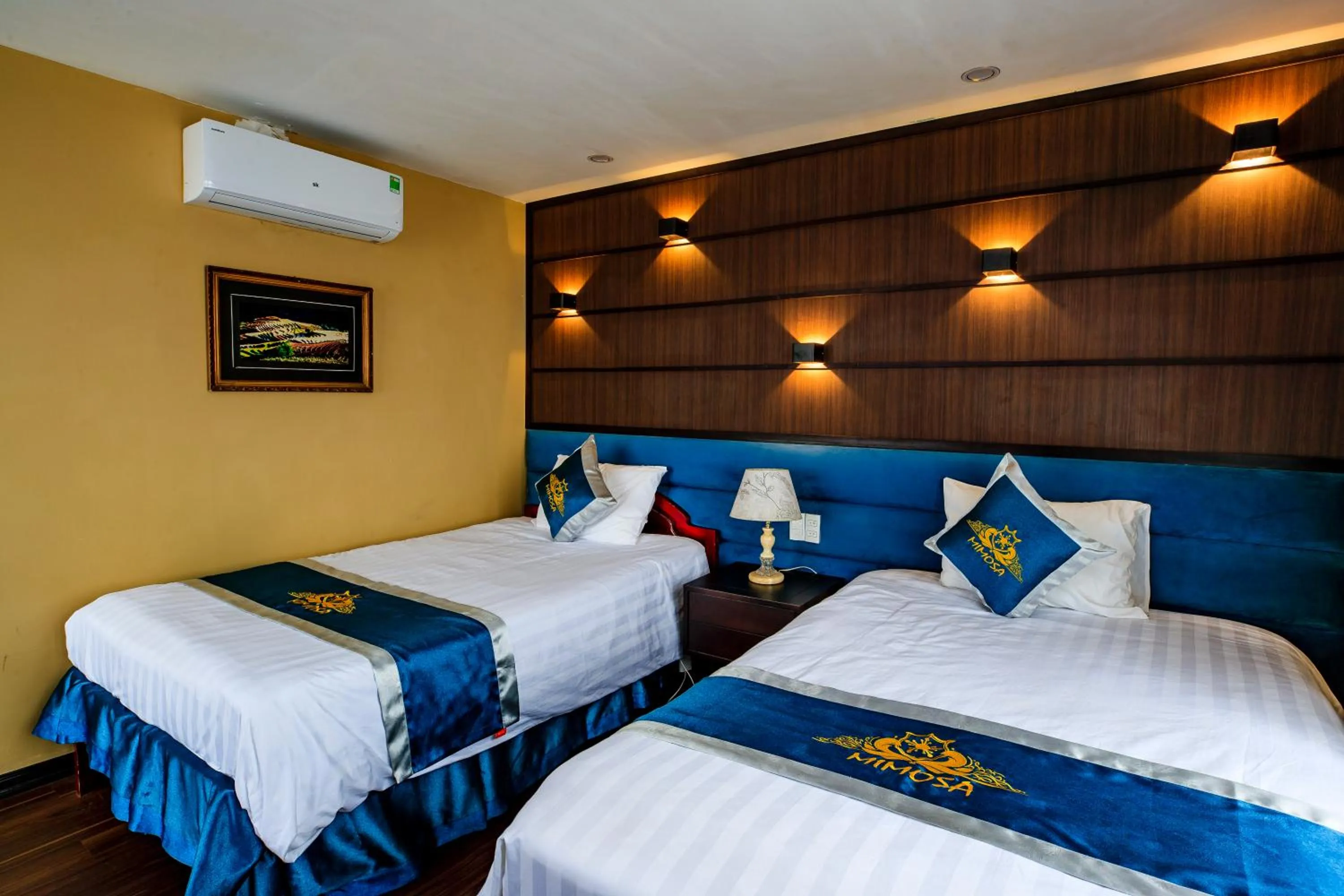 Bed in Mimosa Hotel Sapa