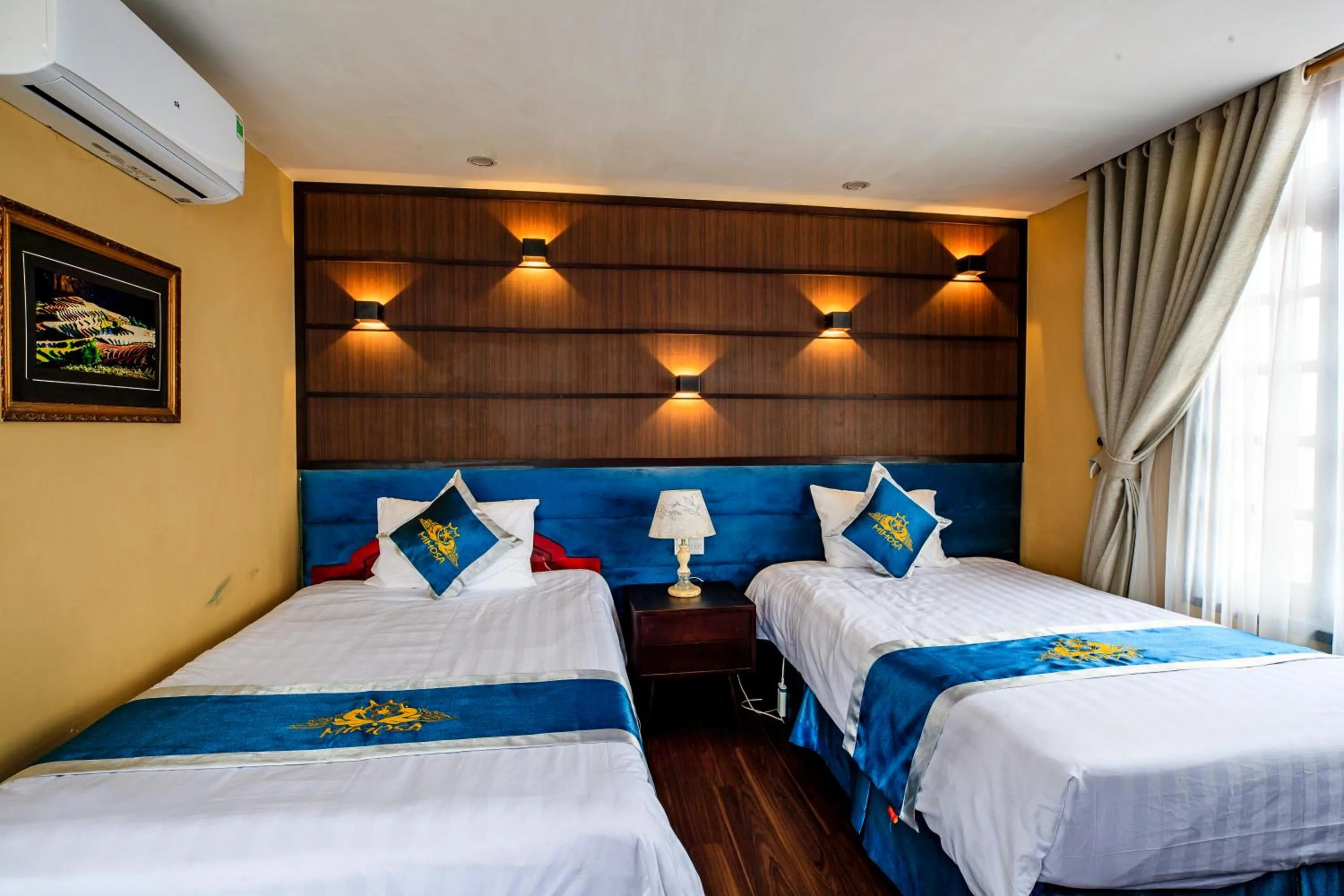 Bed in Mimosa Hotel Sapa