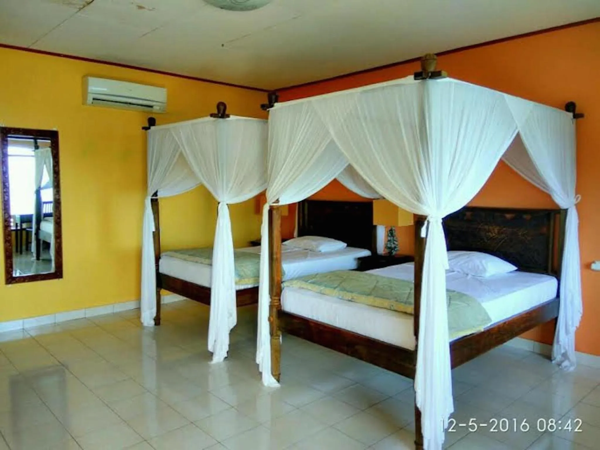 Bed in Sea World Club Beach Resort & Dive Center, RESORT THAT SUPPORTS THE POOR