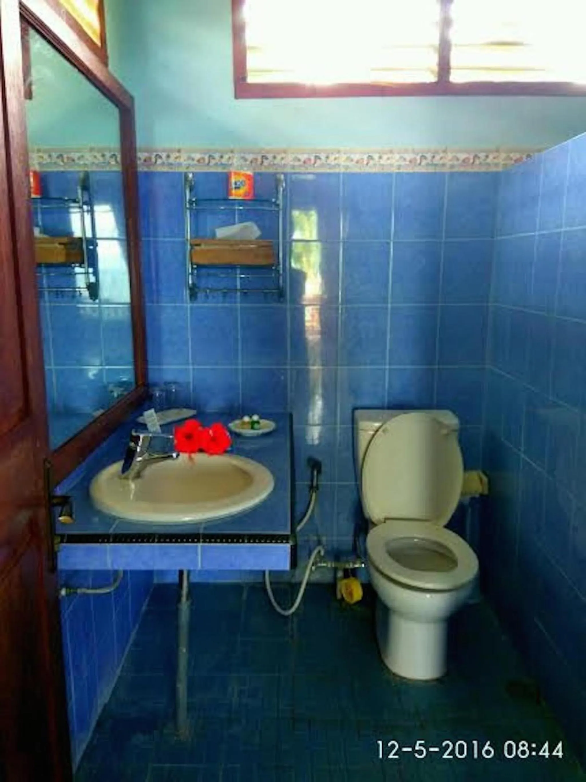 Shower in Sea World Club Beach Resort & Dive Center, RESORT THAT SUPPORTS THE POOR