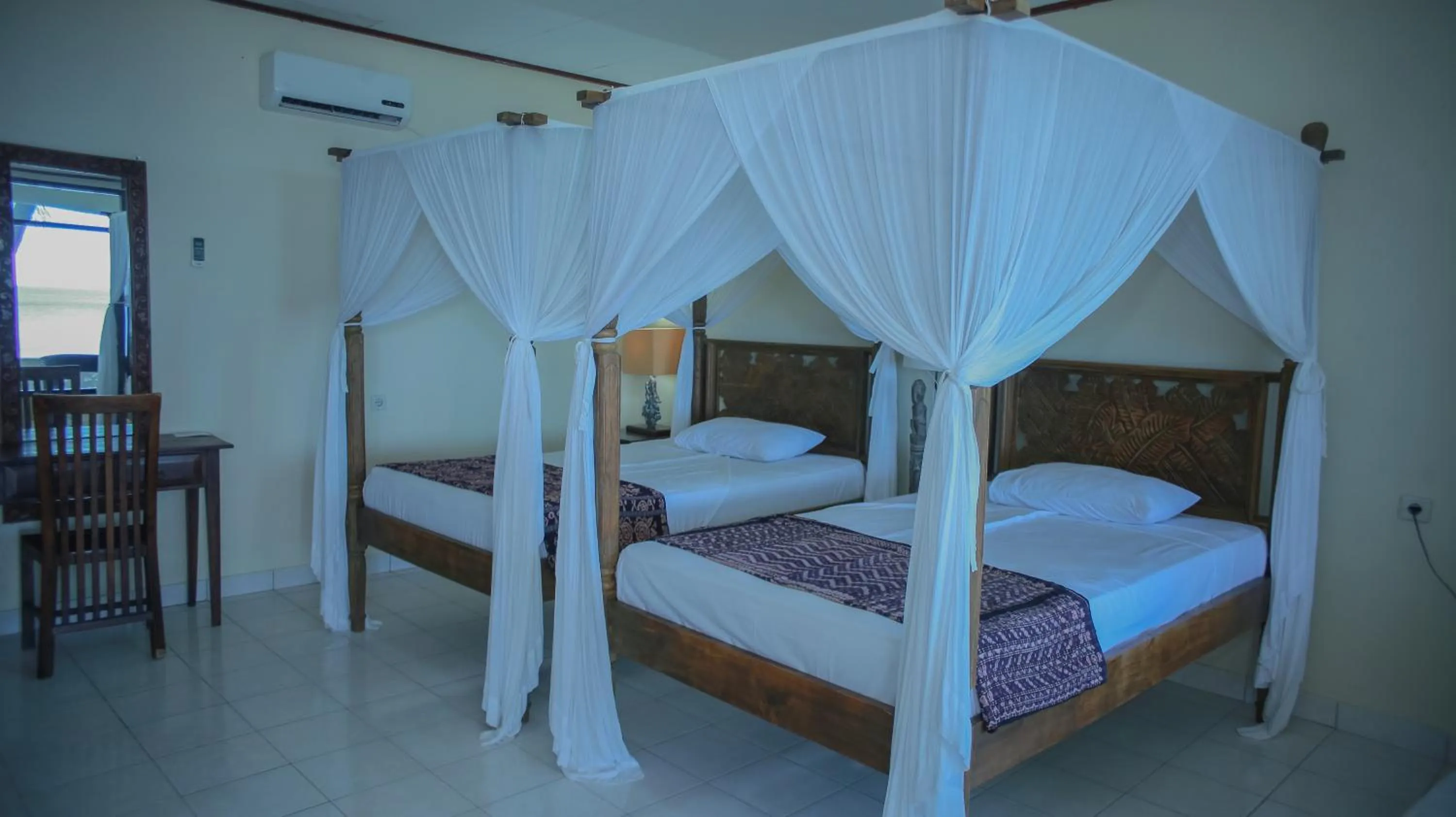 Bed in Sea World Club Beach Resort & Dive Center, RESORT THAT SUPPORTS THE POOR