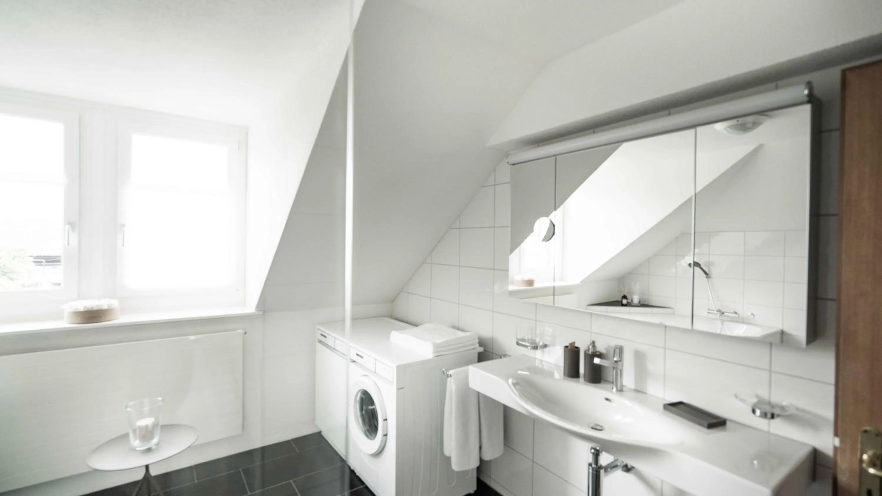 Bathroom in Löwenplatz Apartment near Station by Airhome